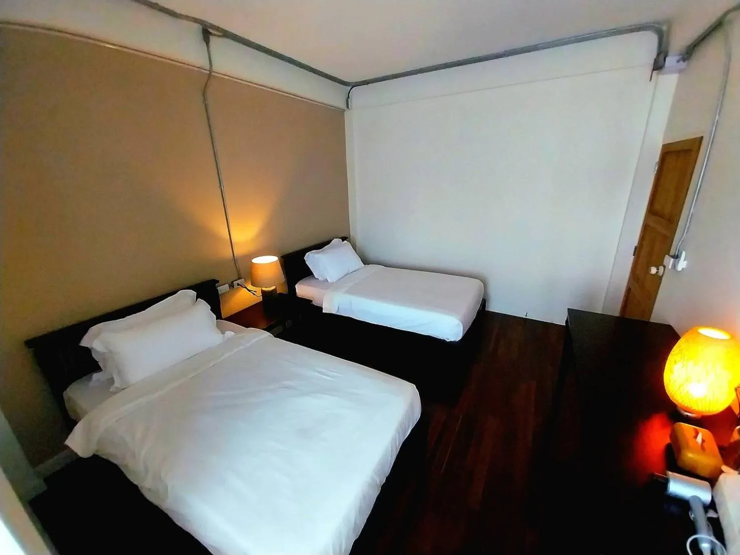 Bed in To The Moon Guesthouse