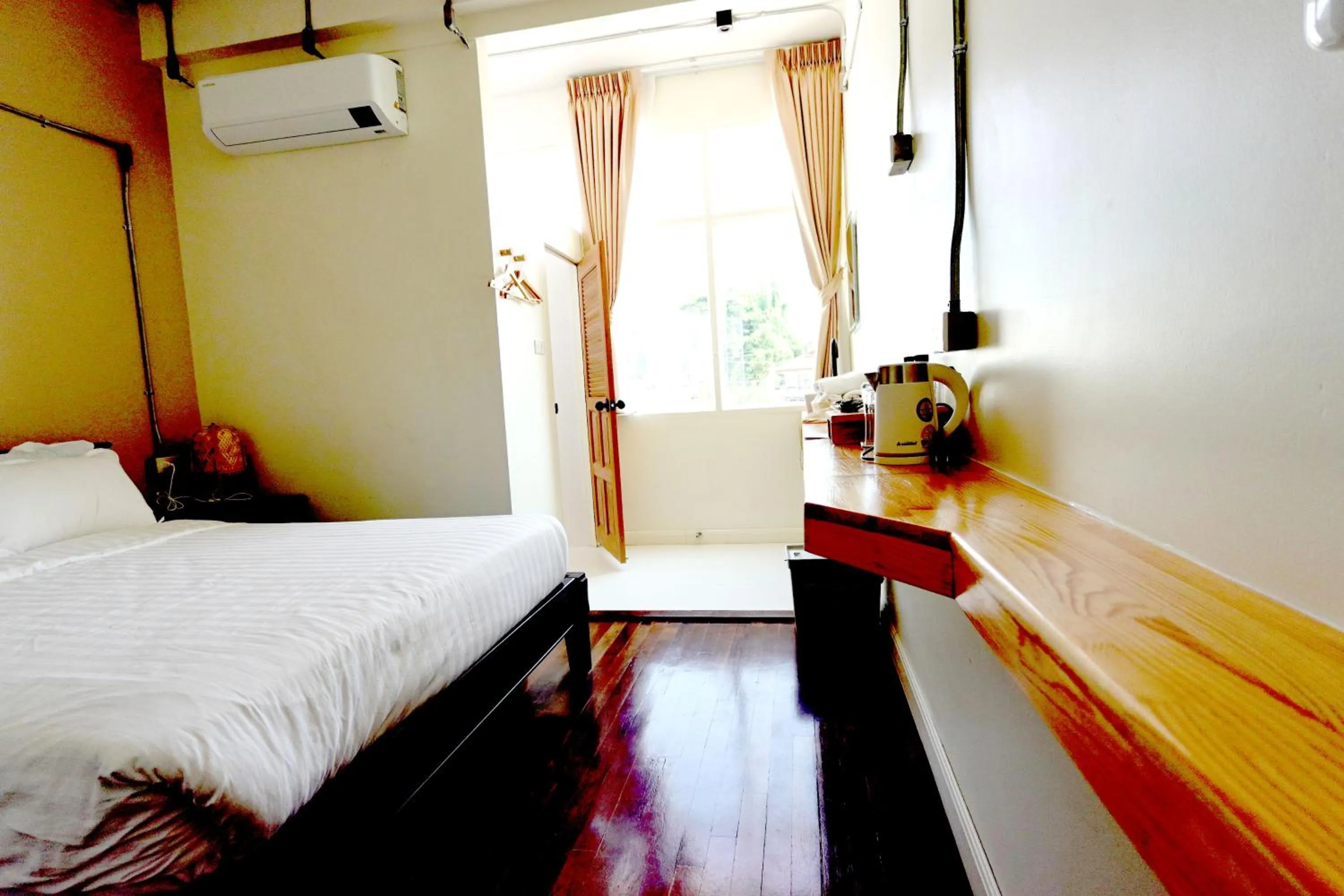 Bed in To The Moon Guesthouse