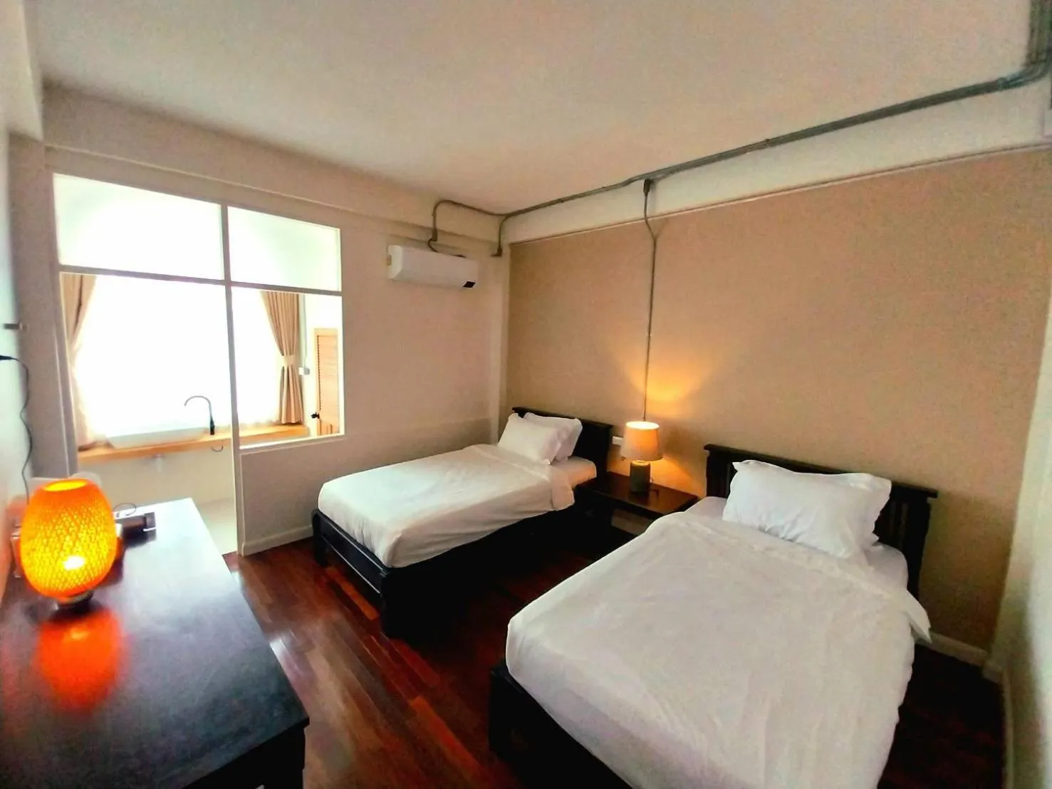 Bed in To The Moon Guesthouse