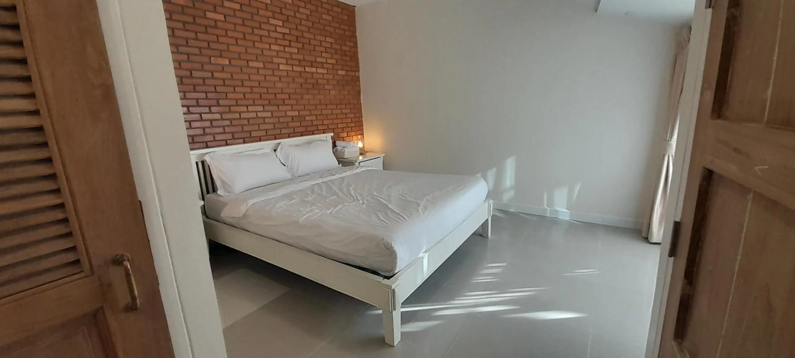 Bed in To The Moon Guesthouse