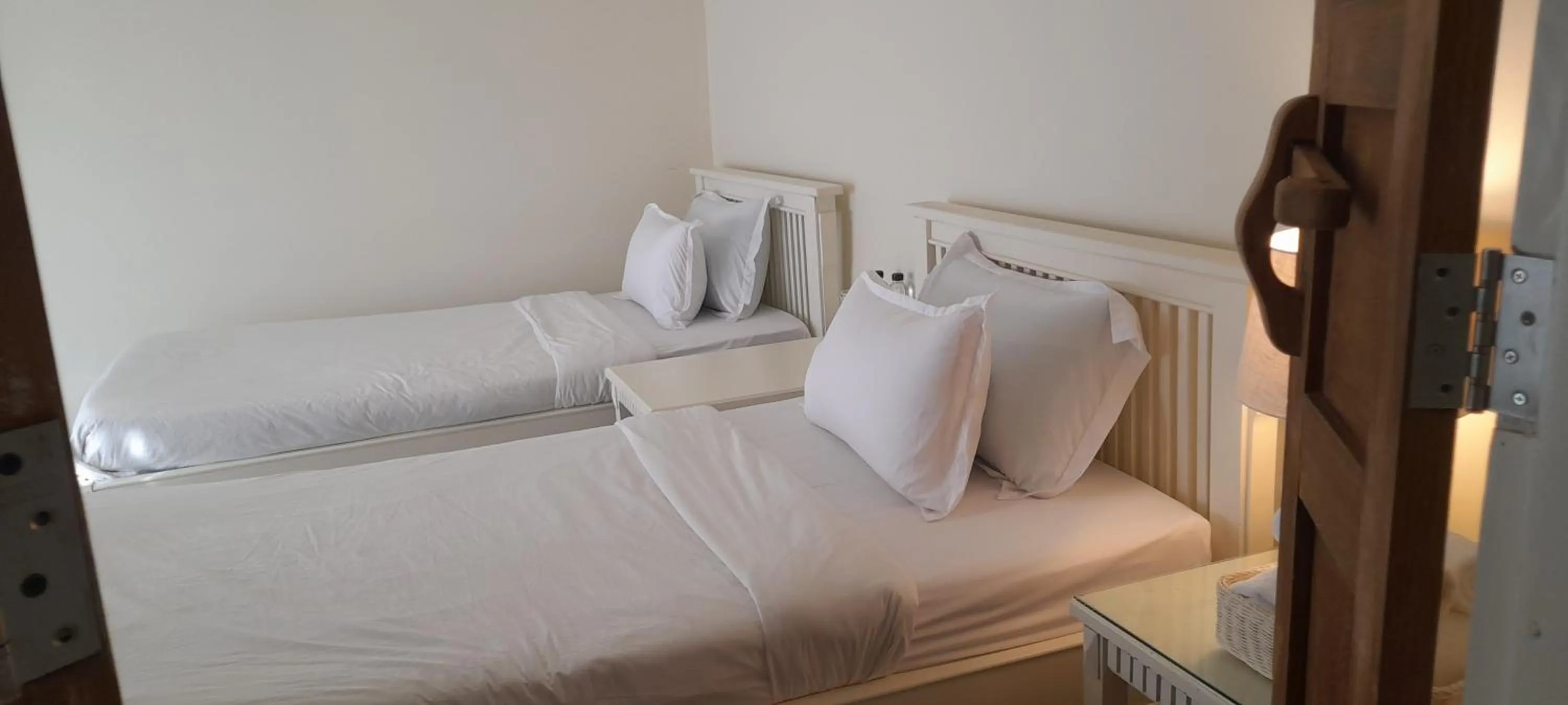 Bed in To The Moon Guesthouse