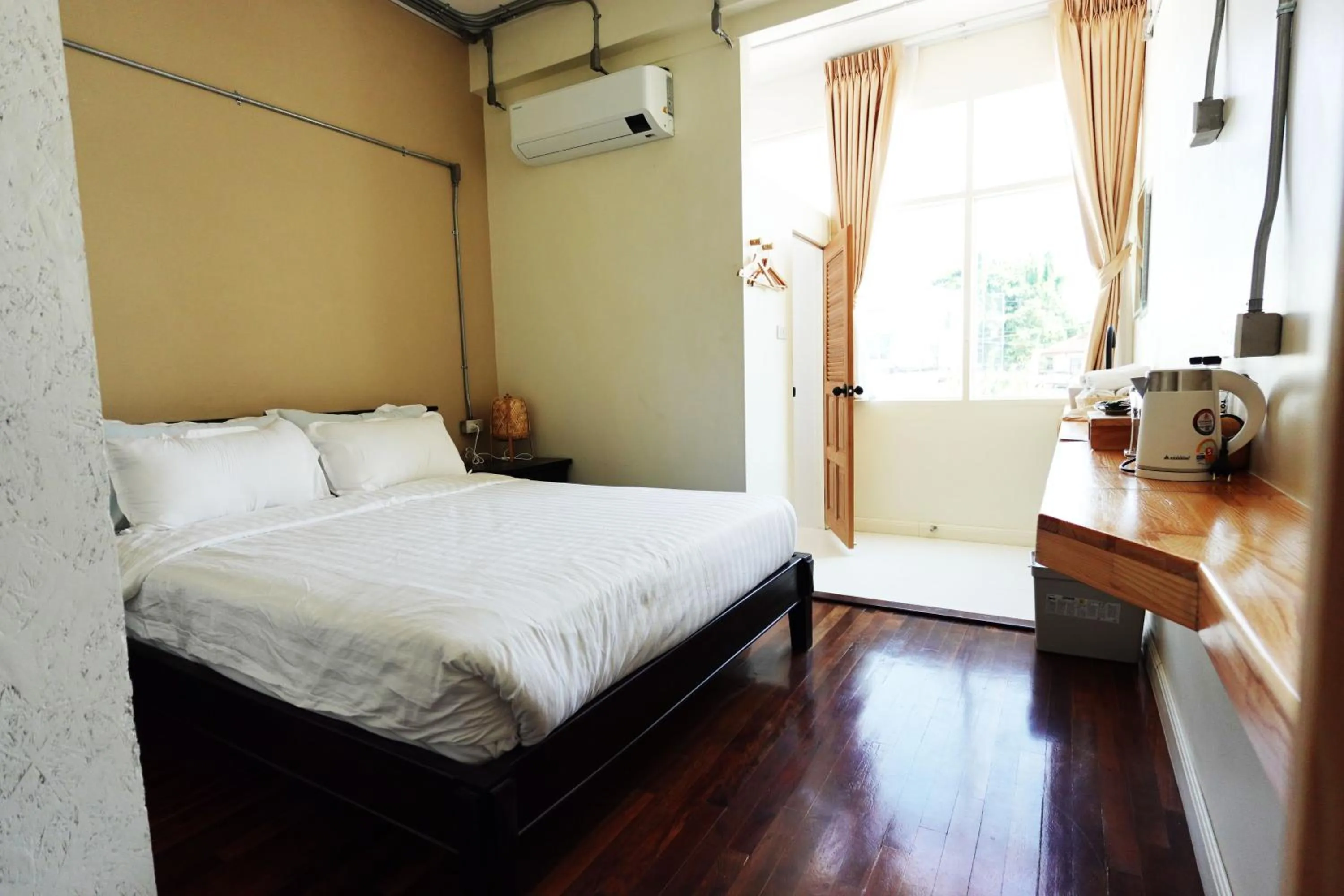 Bed in To The Moon Guesthouse