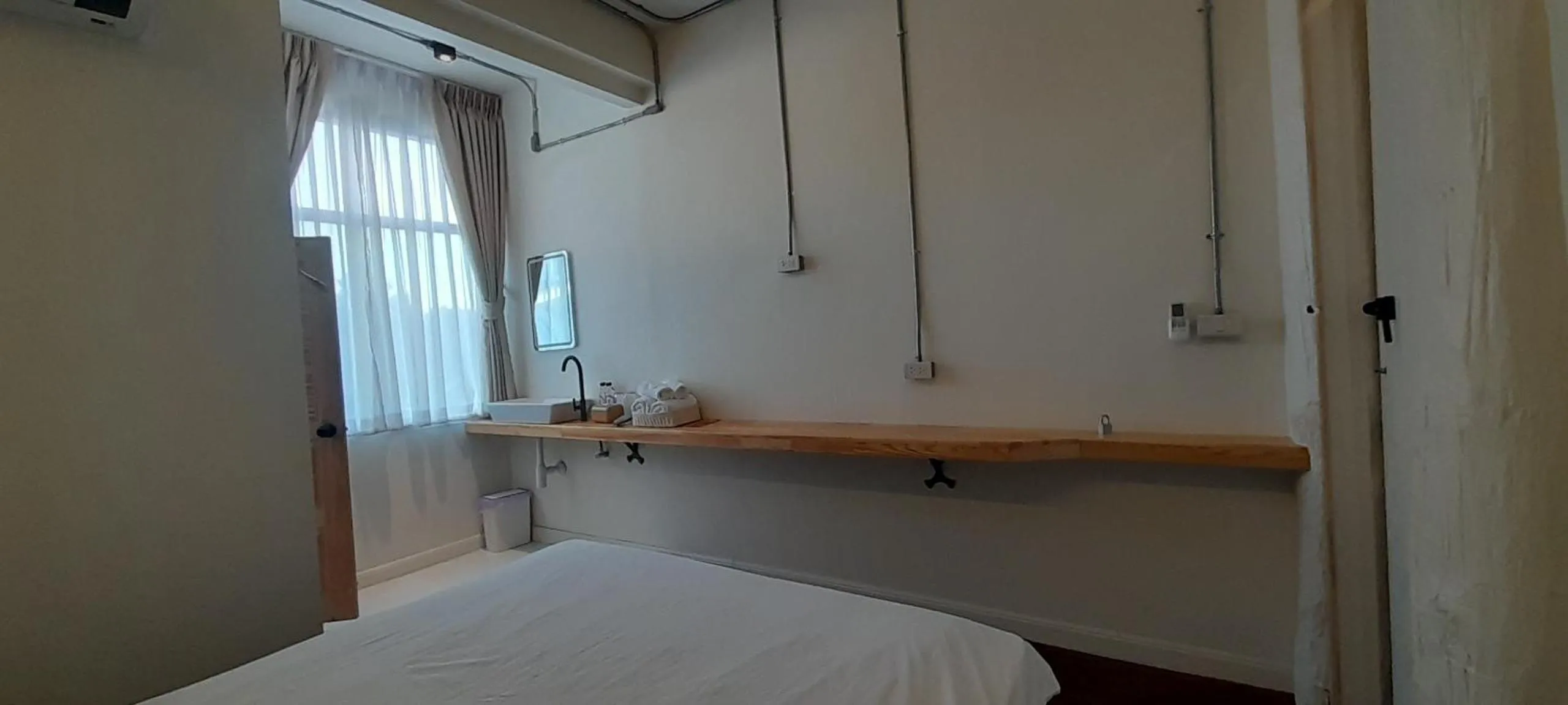 Bed in To The Moon Guesthouse