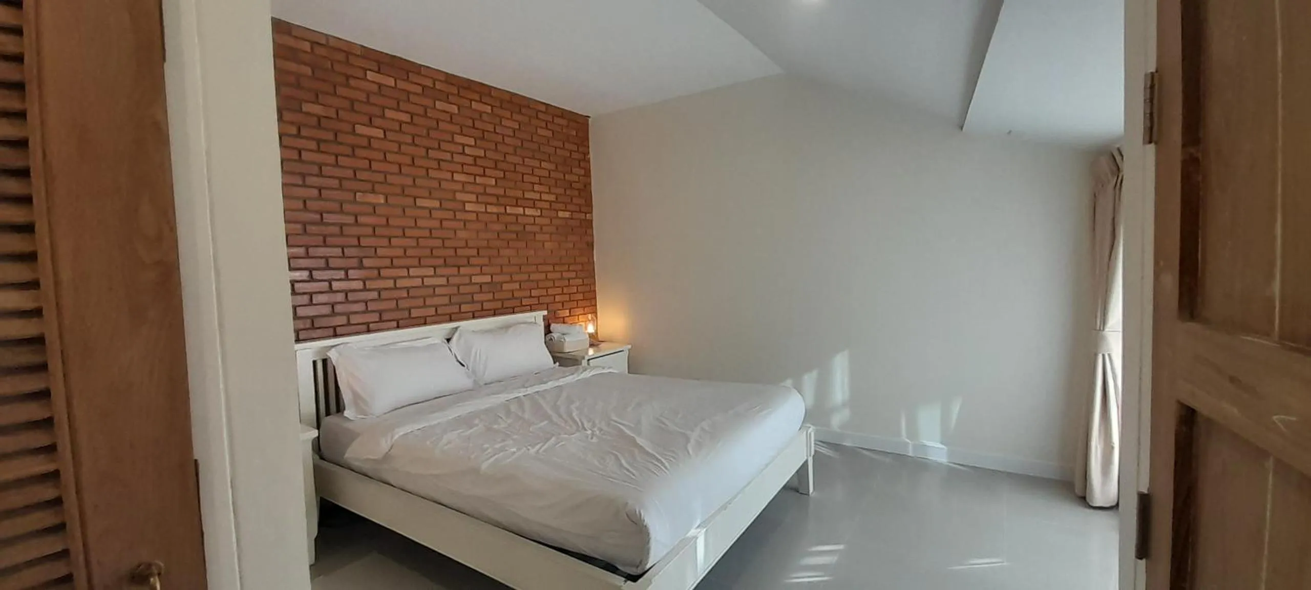 Bed in To The Moon Guesthouse