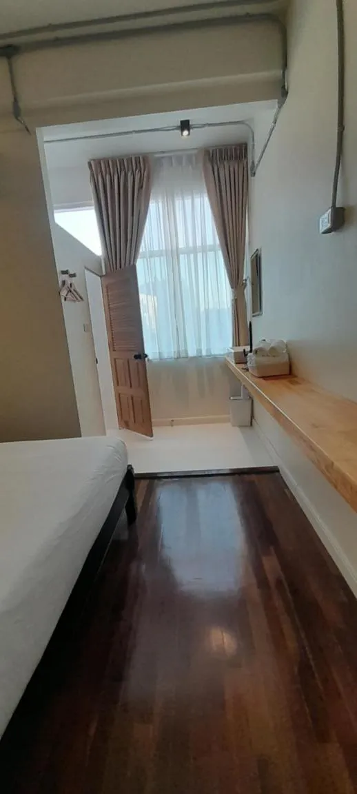 Bed in To The Moon Guesthouse