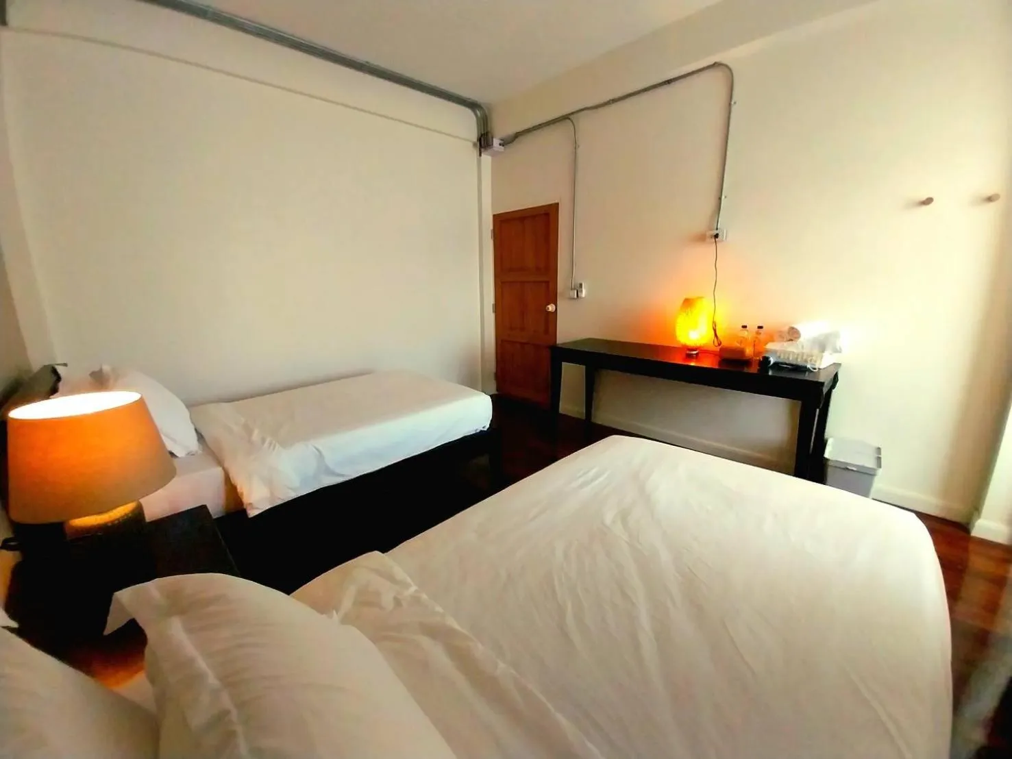 Bed in To The Moon Guesthouse