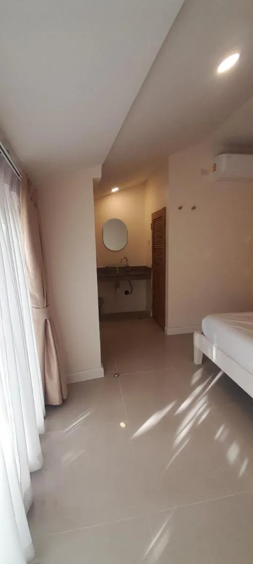 Bed in To The Moon Guesthouse