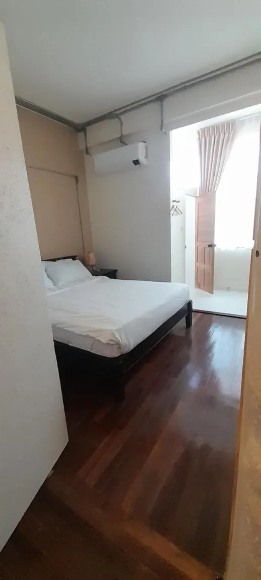 Bed in To The Moon Guesthouse