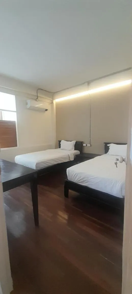 Bed in To The Moon Guesthouse