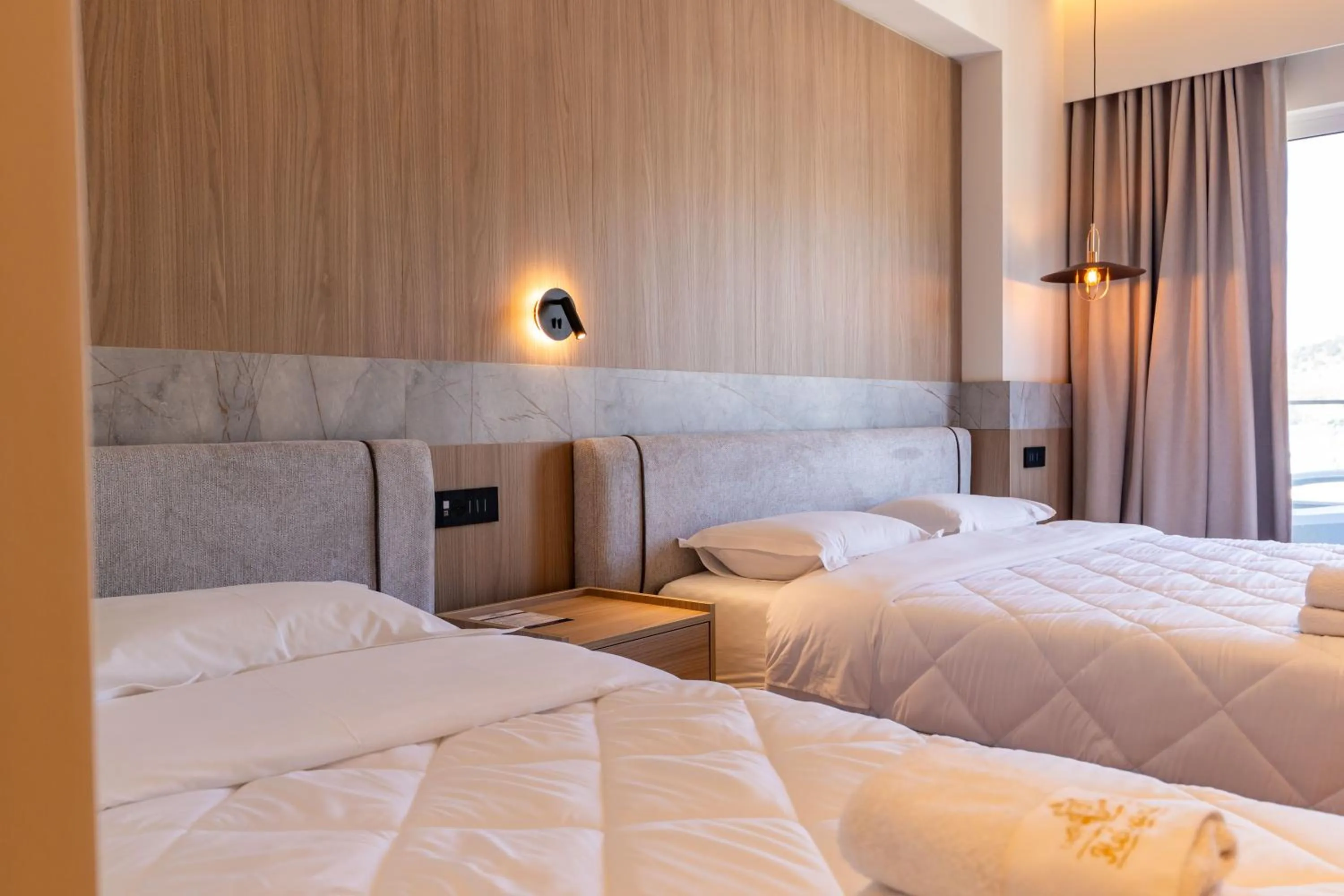 Bed in Heksamil Hotel