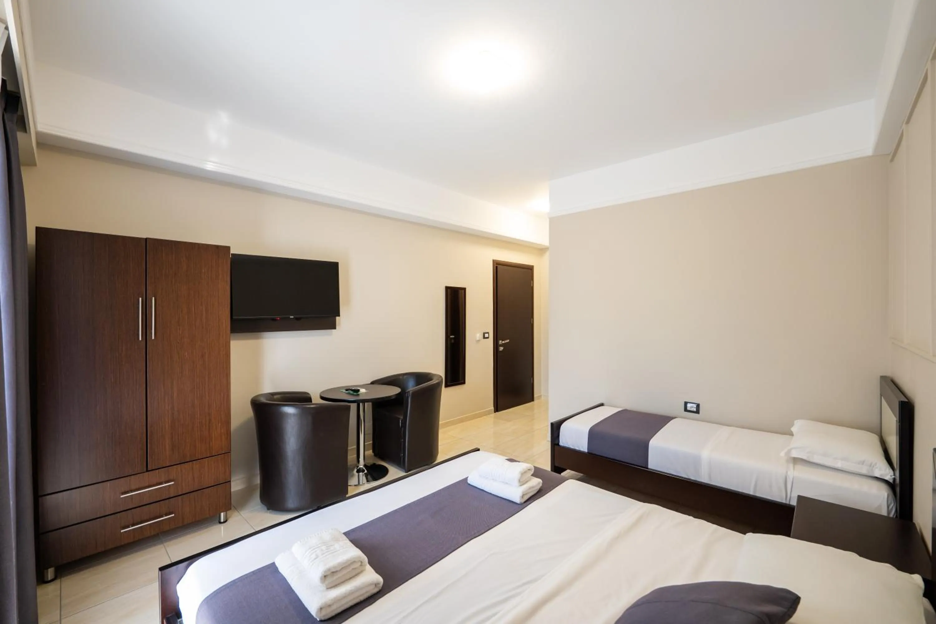 Bed in Heksamil Hotel