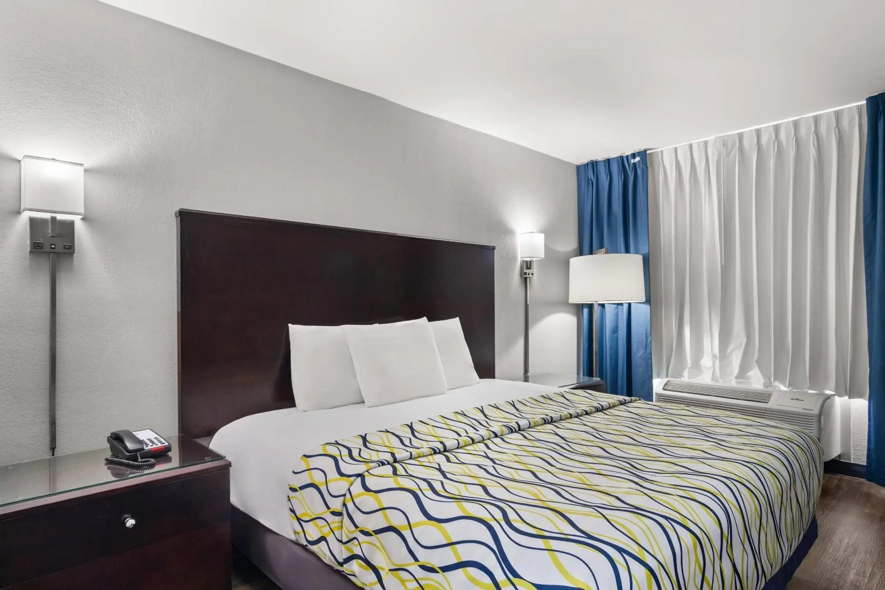 Bedroom, Bed in Suburban Studios Orange Park - Jacksonville near Naval Air Station Bedroom, Bed in Suburban Studios Orange Park - Jacksonville near Naval Air Station