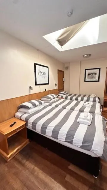 Bed in Shanahans B&B with Sports Bar