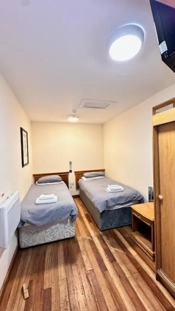 Bed in Shanahans B&B with Sports Bar