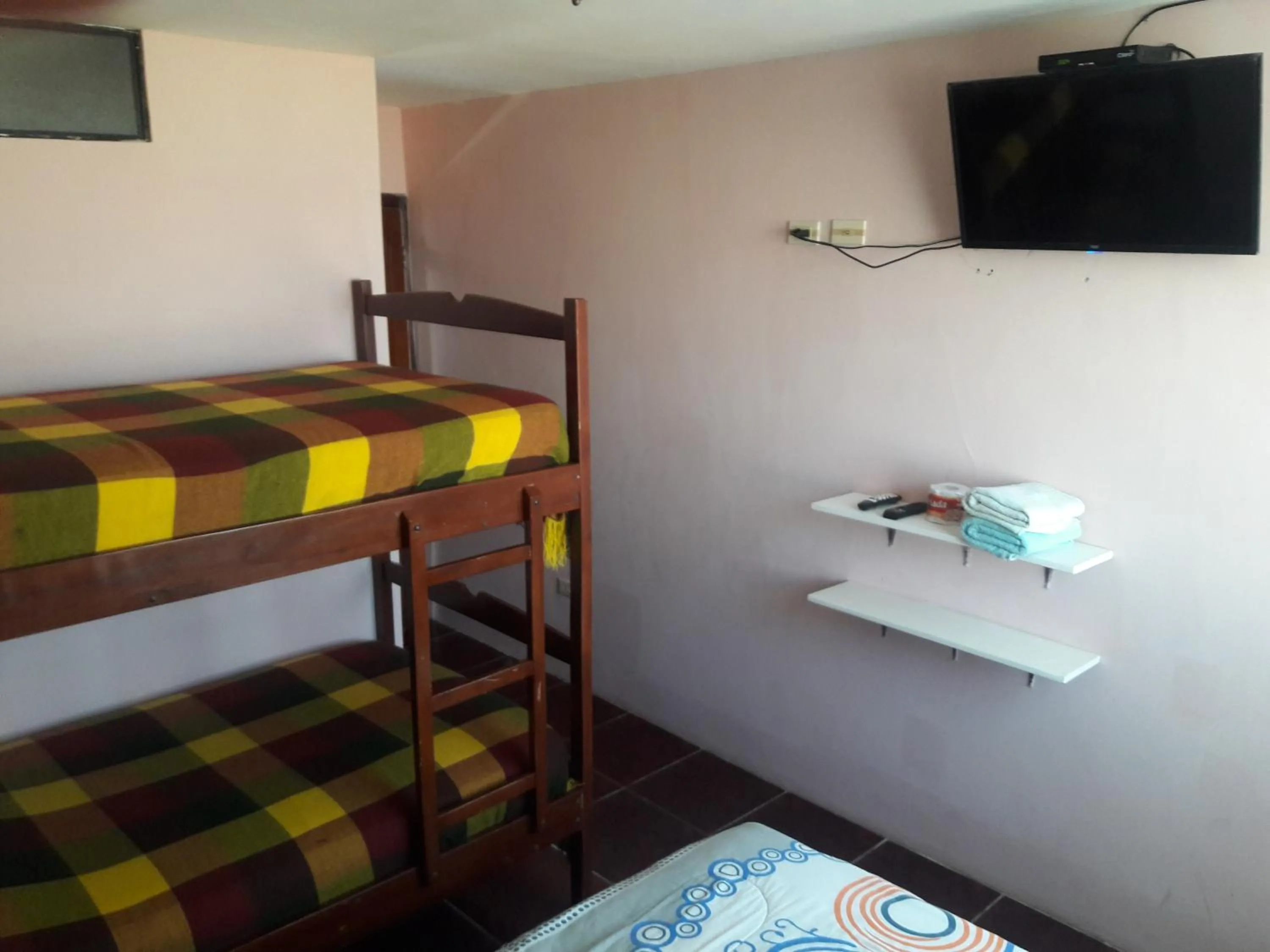 TV and multimedia, Bed in Hostal Haziel