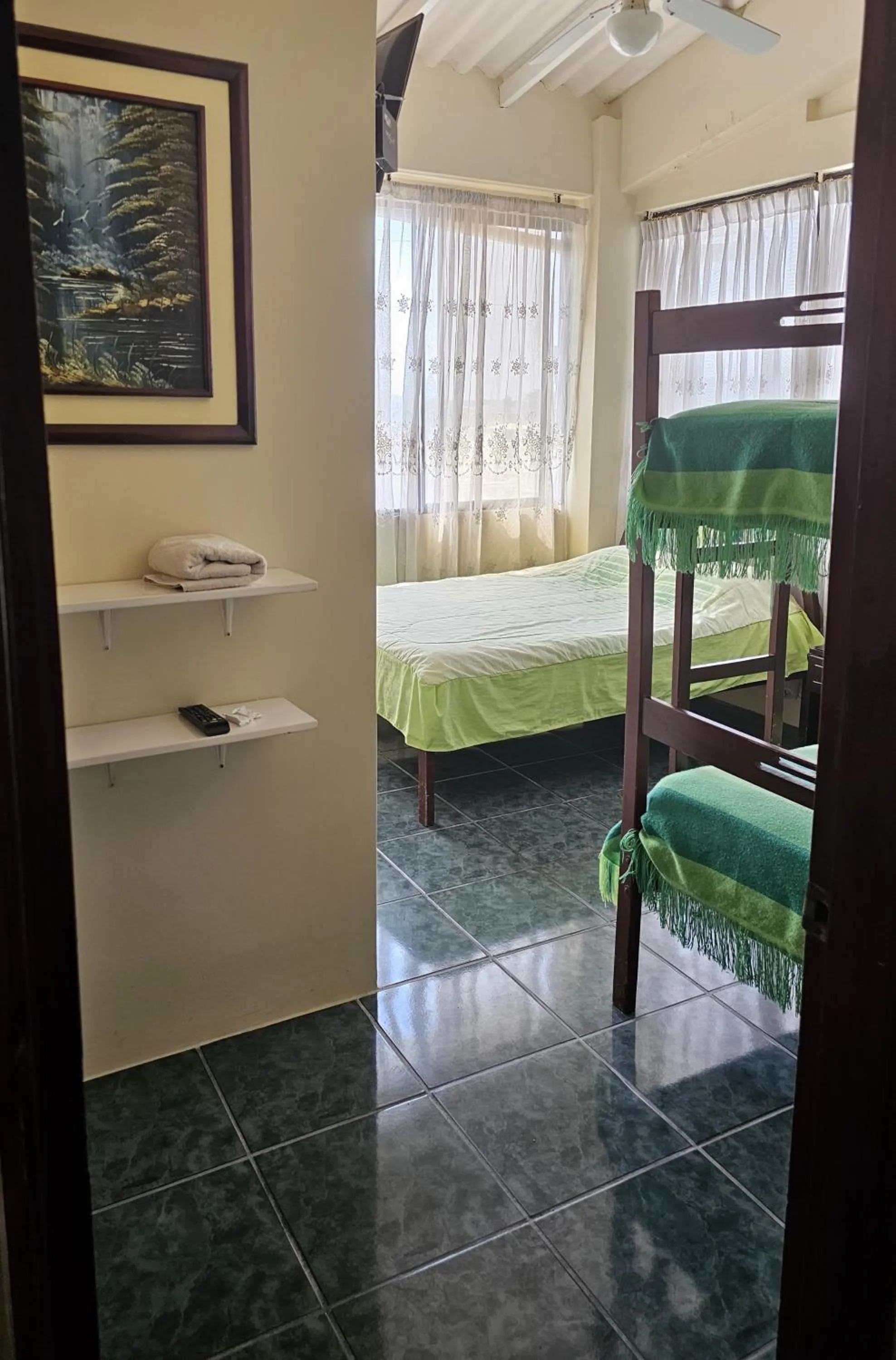 Facade/entrance, Bed in Hostal Haziel