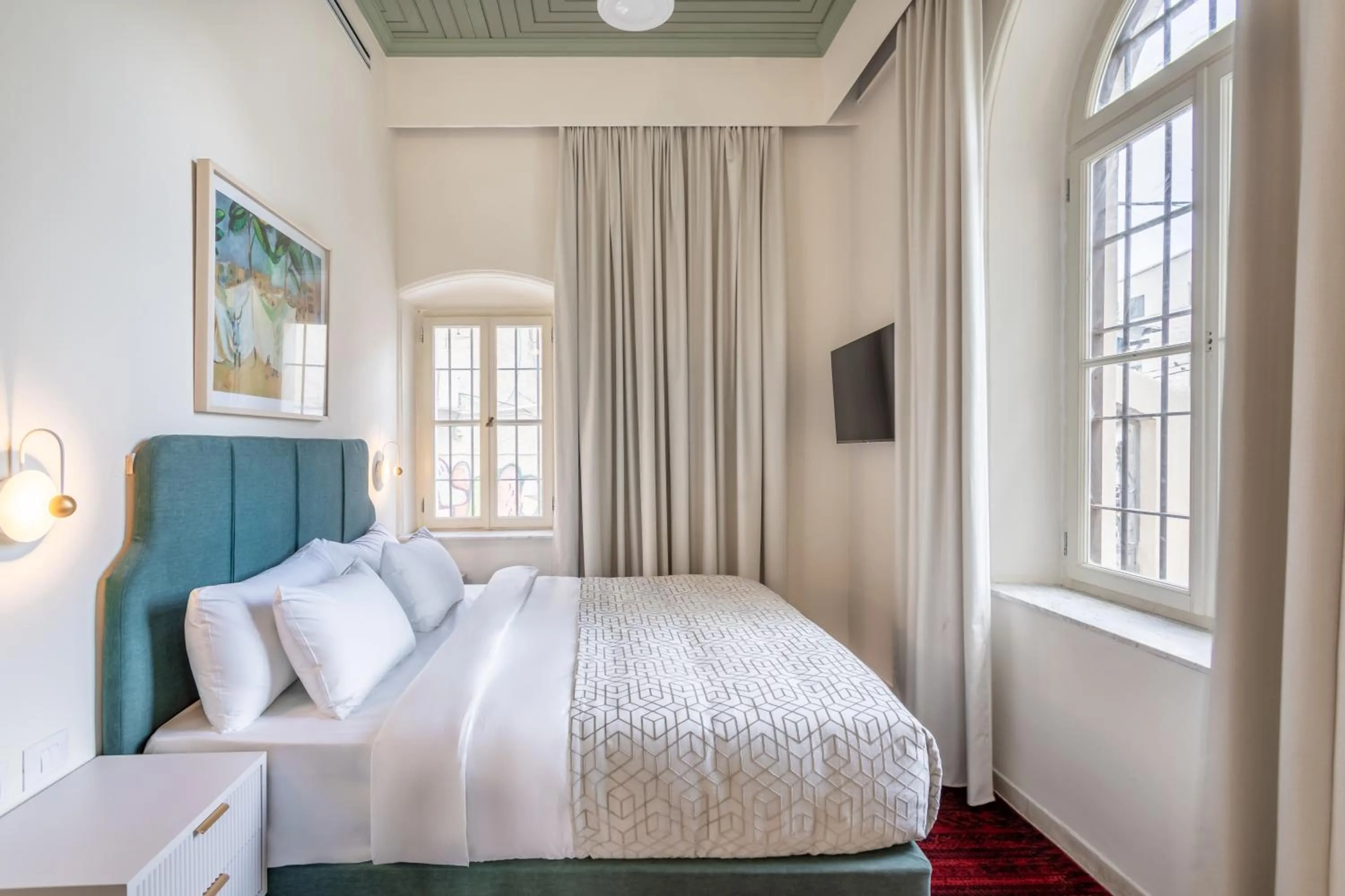 Photo of the whole room, Bed in THE GUTMAN TLV - Neve Tzedek