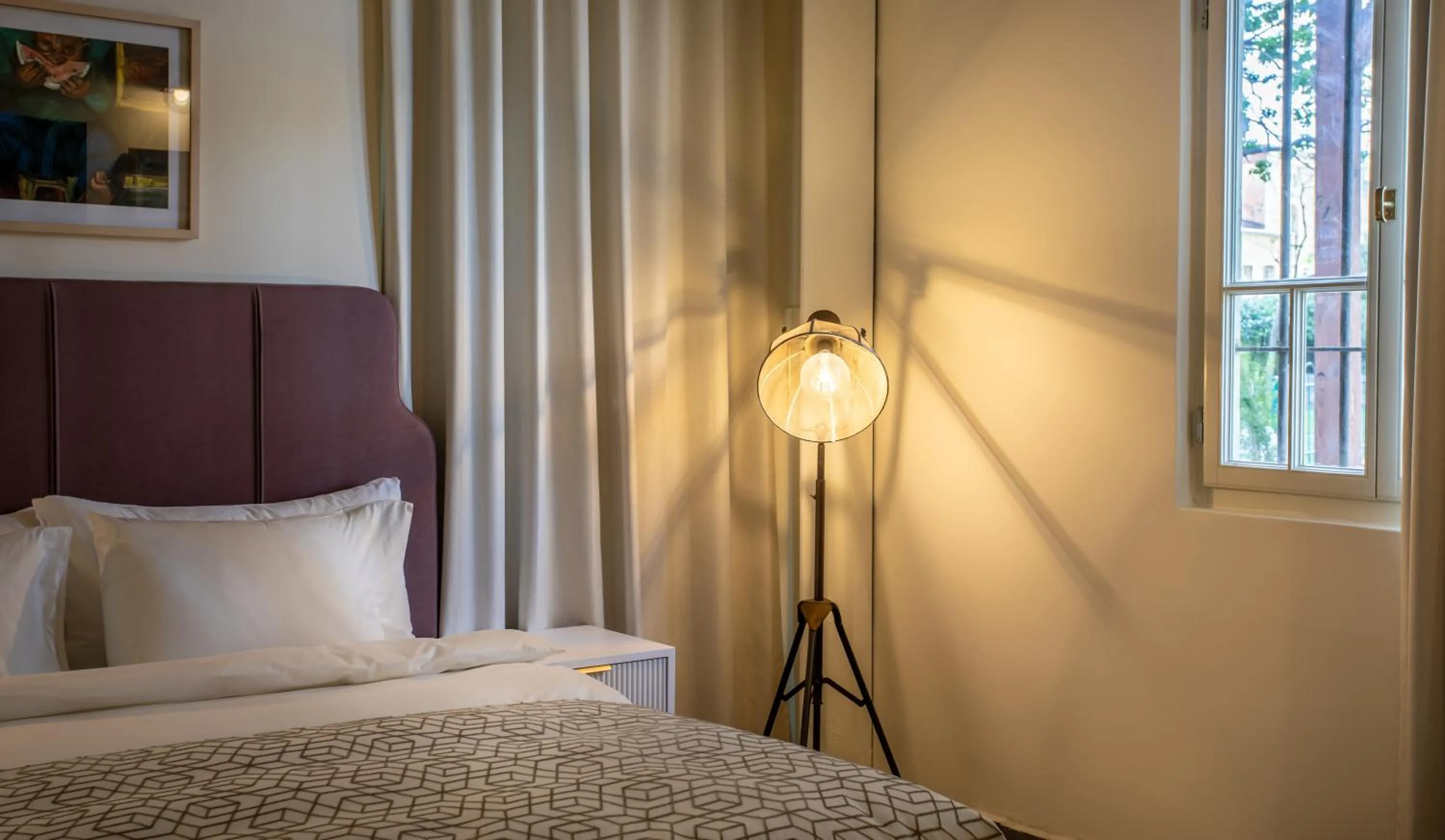 Photo of the whole room, Bed in THE GUTMAN TLV - Neve Tzedek
