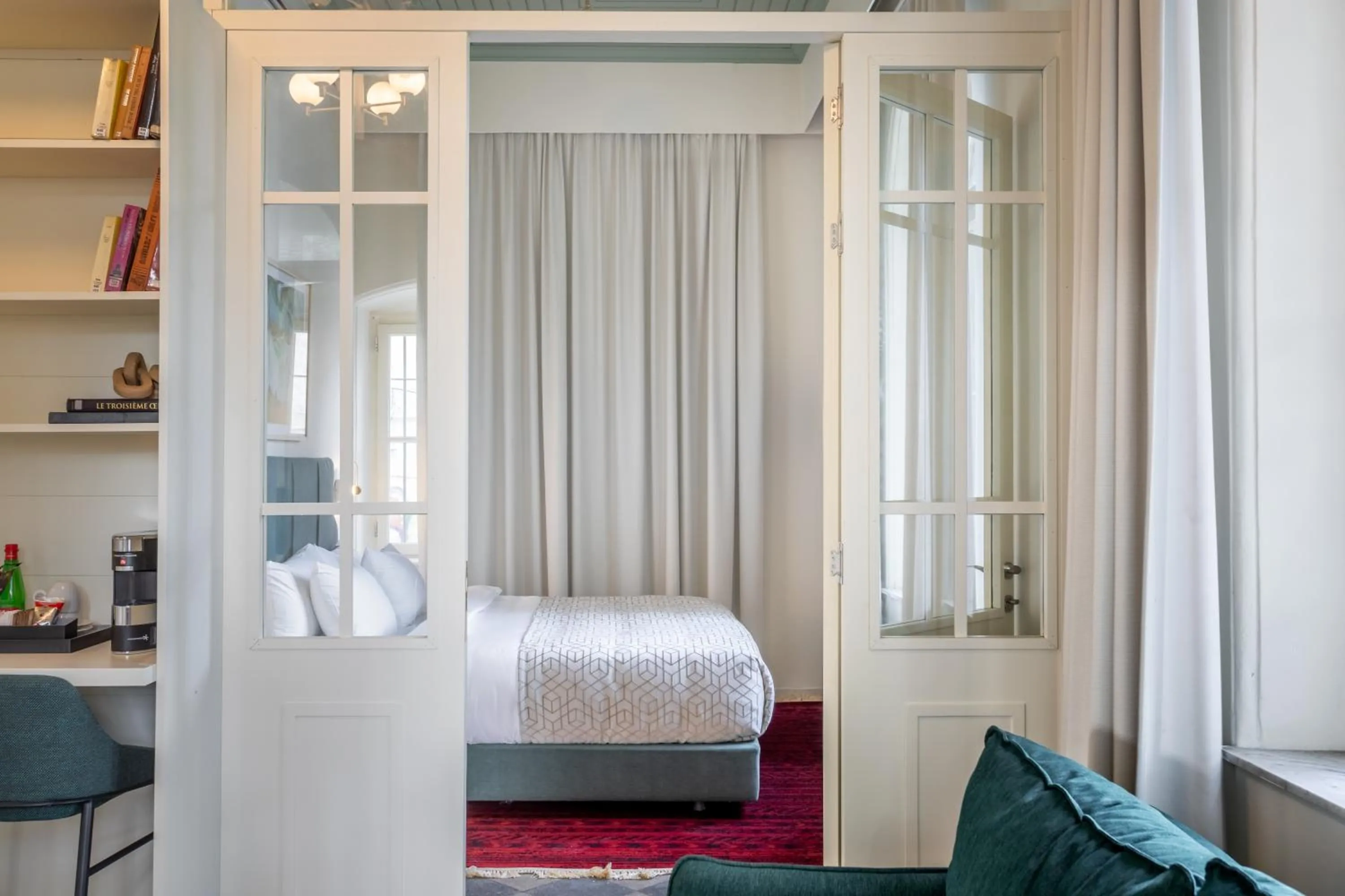 Photo of the whole room, Bed in THE GUTMAN TLV - Neve Tzedek