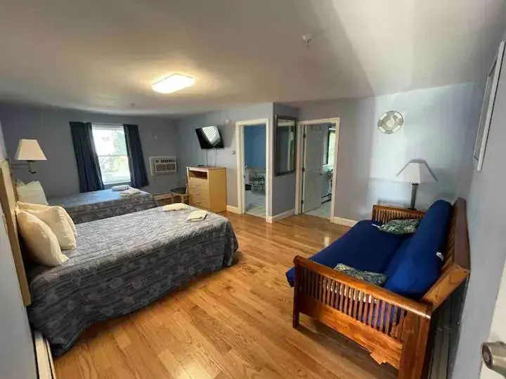 Deluxe 2 Double Beds, Futon and Kitchen (Corner Unit - STEPS REQUIRED - V12) in Beau Rivage Motel Deluxe 2 Double Beds, Futon and Kitchen (Corner Unit - STEPS REQUIRED - V12) in Beau Rivage Motel