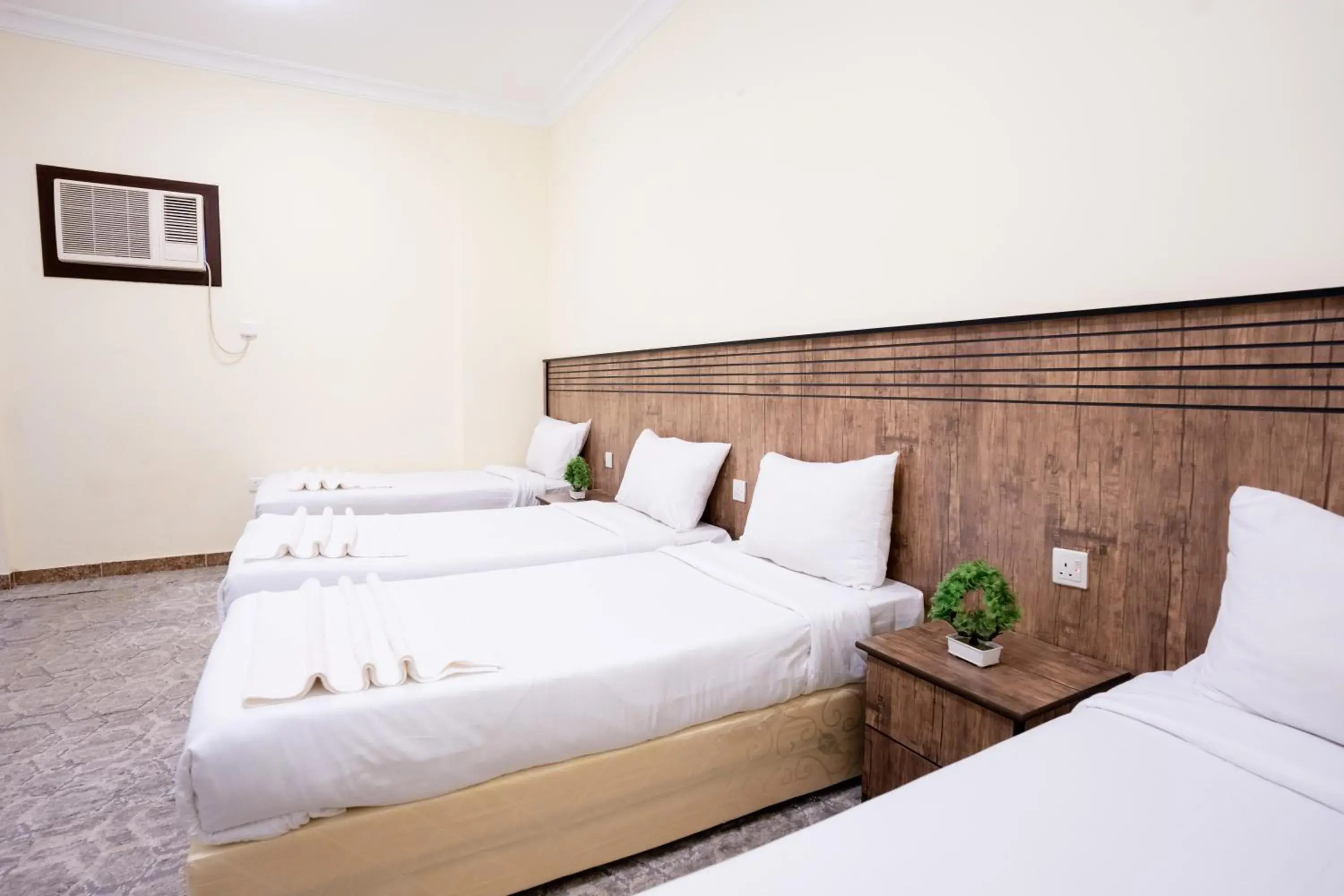 Quadruple Room with Private Bathroom in Saif Plus 3 Hotel by Orvana Quadruple Room with Private Bathroom in Saif Plus 3 Hotel by Orvana