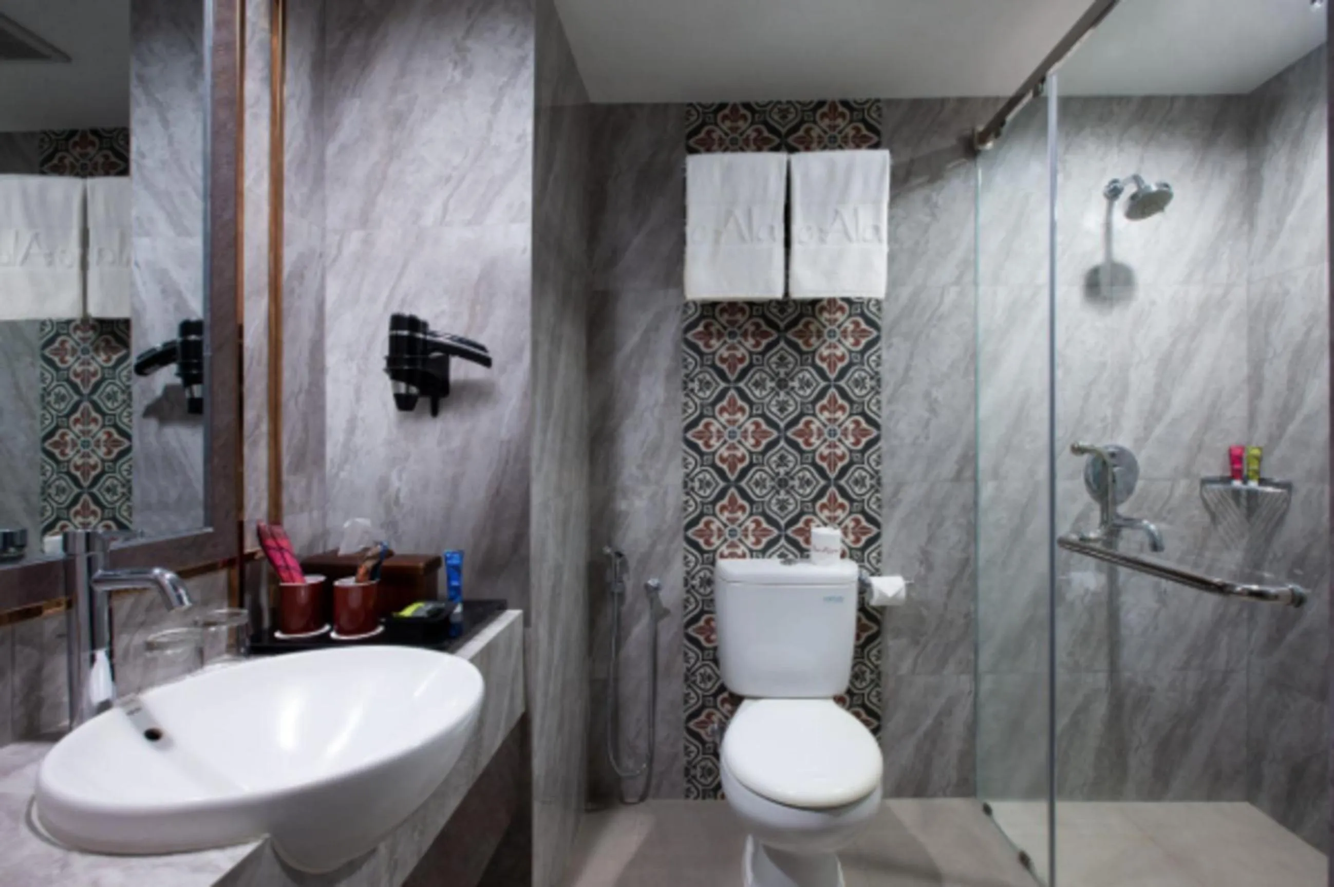 Bathroom in The Alana Hotel & Conference Center Malioboro Yogyakarta by ASTON