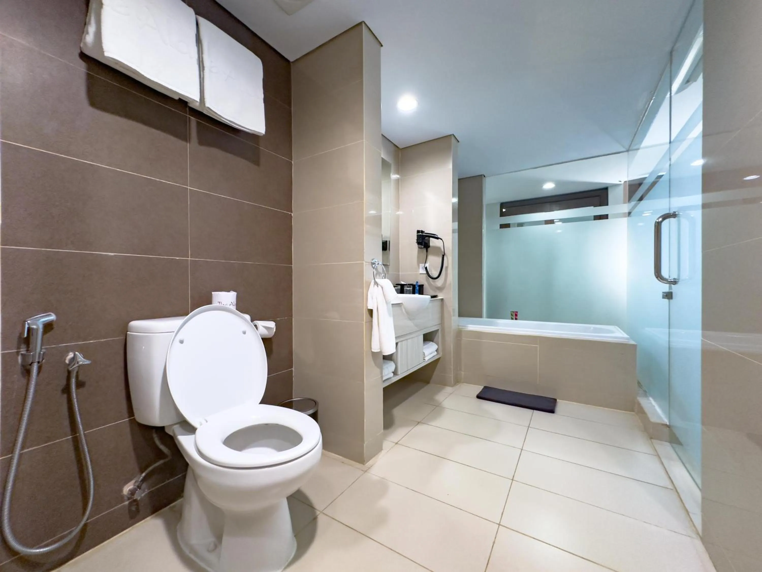 Bathroom in The Alana Hotel & Conference Center Malioboro Yogyakarta by ASTON