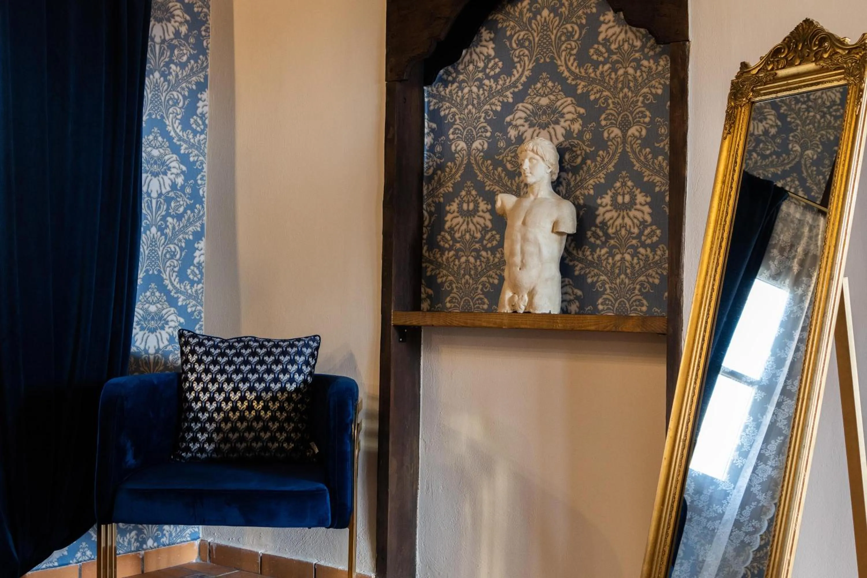 Seating area in April Medieval Hotel