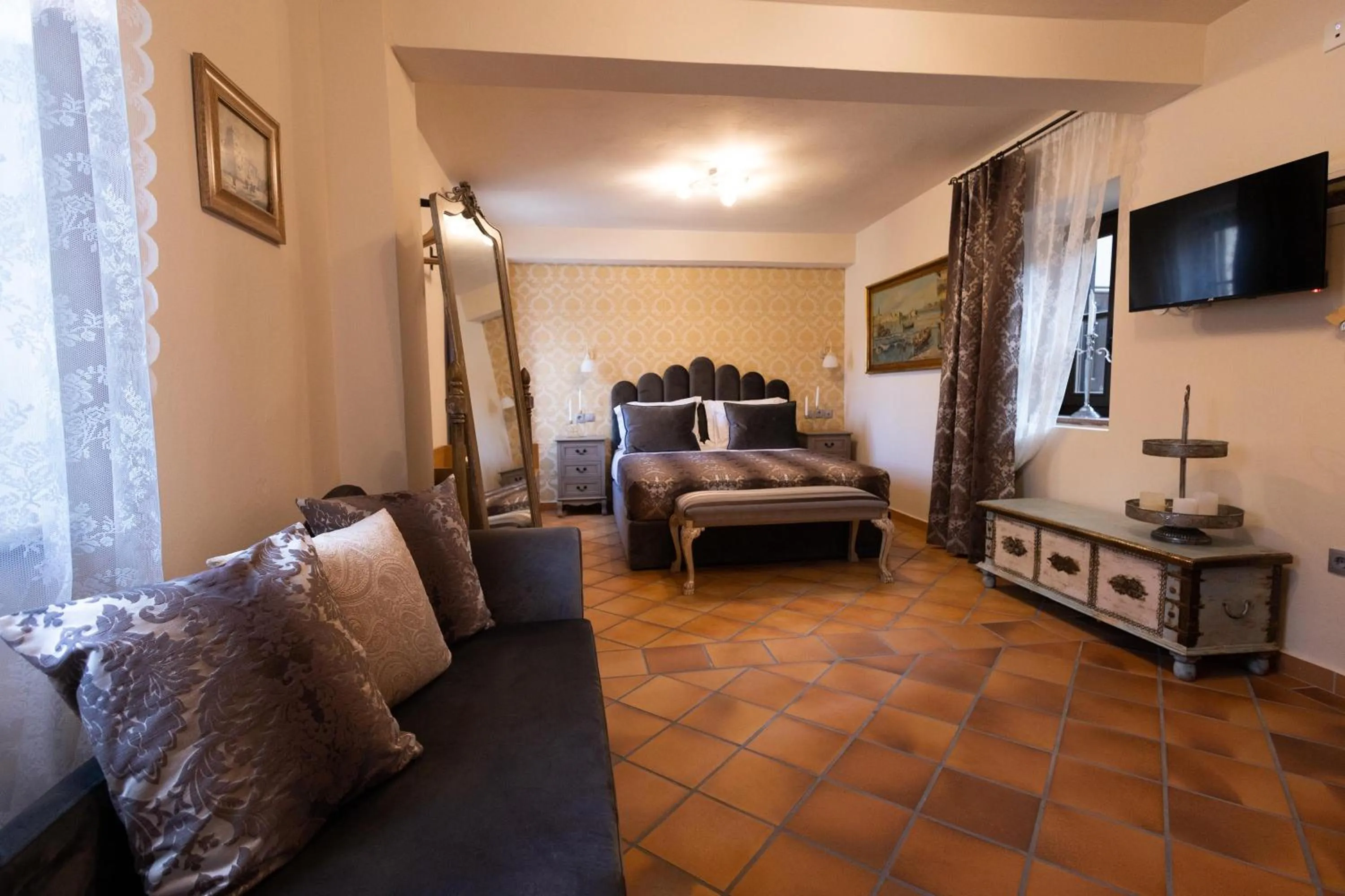 Bed in April Medieval Hotel