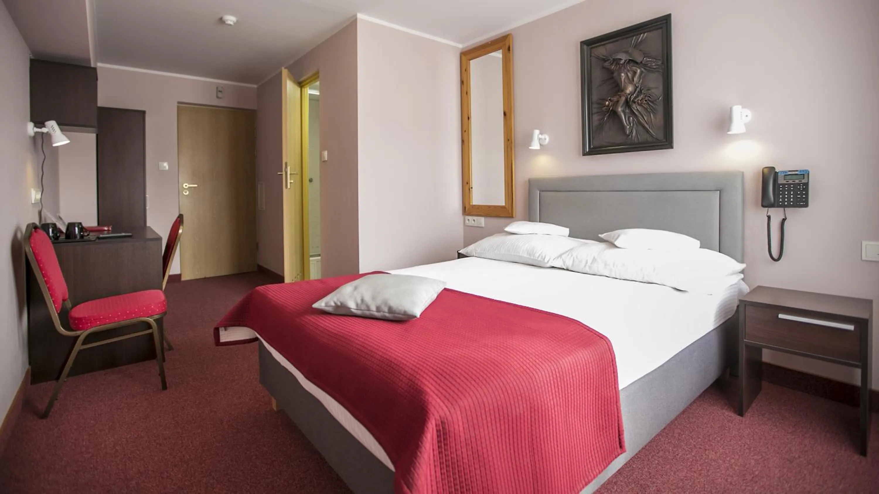 Photo of the whole room, Bed in Hotel Unibus