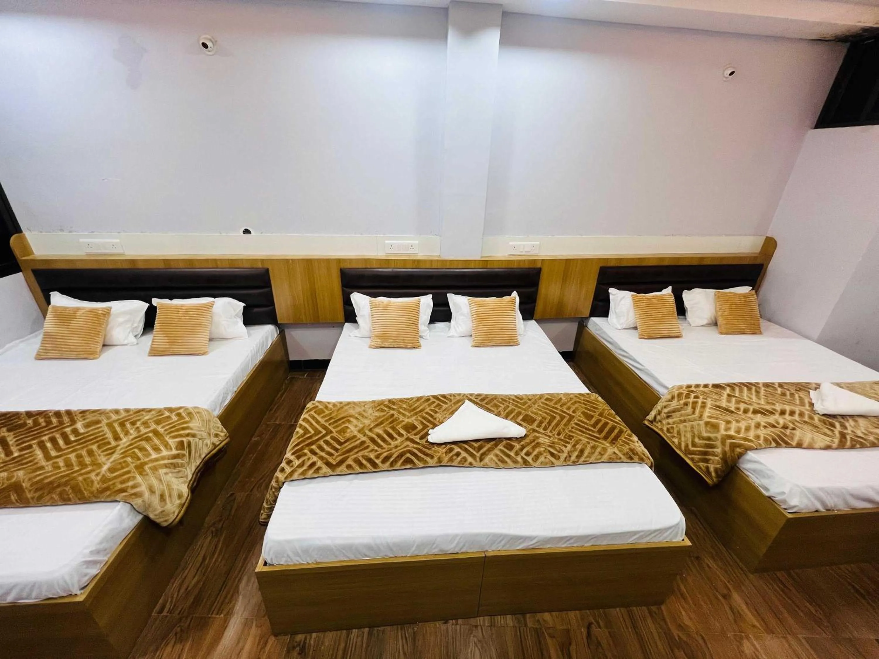 Bed in Hotel Advika Ujjain