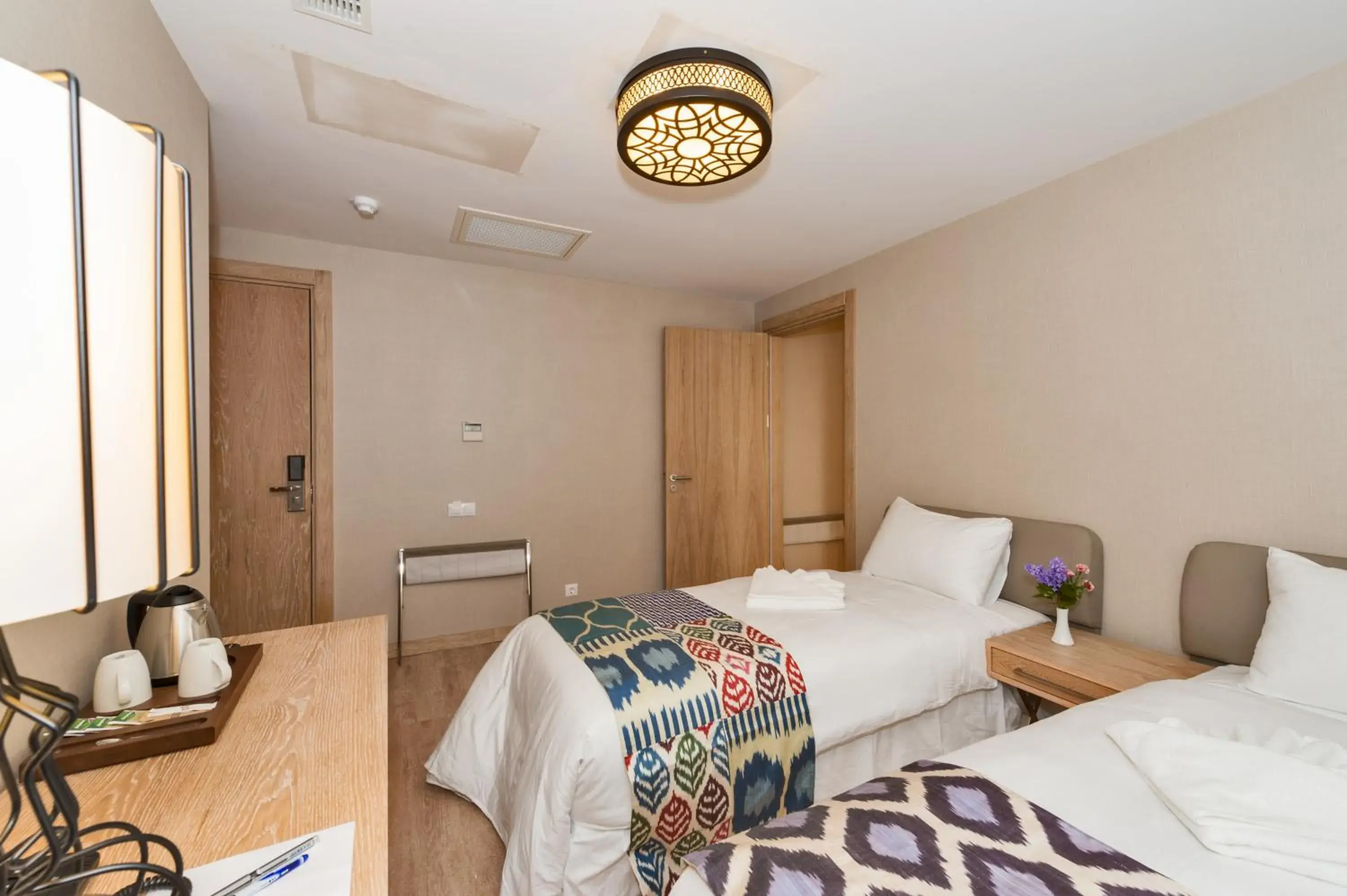 Coffee/tea facilities, Bed in Aybar Hotel & Spa Coffee/tea facilities, Bed in Aybar Hotel & Spa