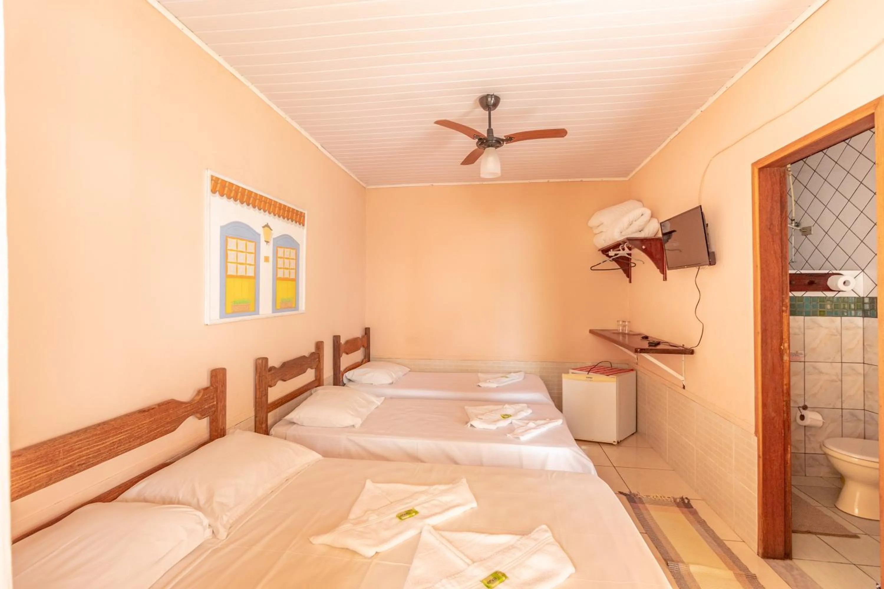 Bed in Pousada Luz do Sol