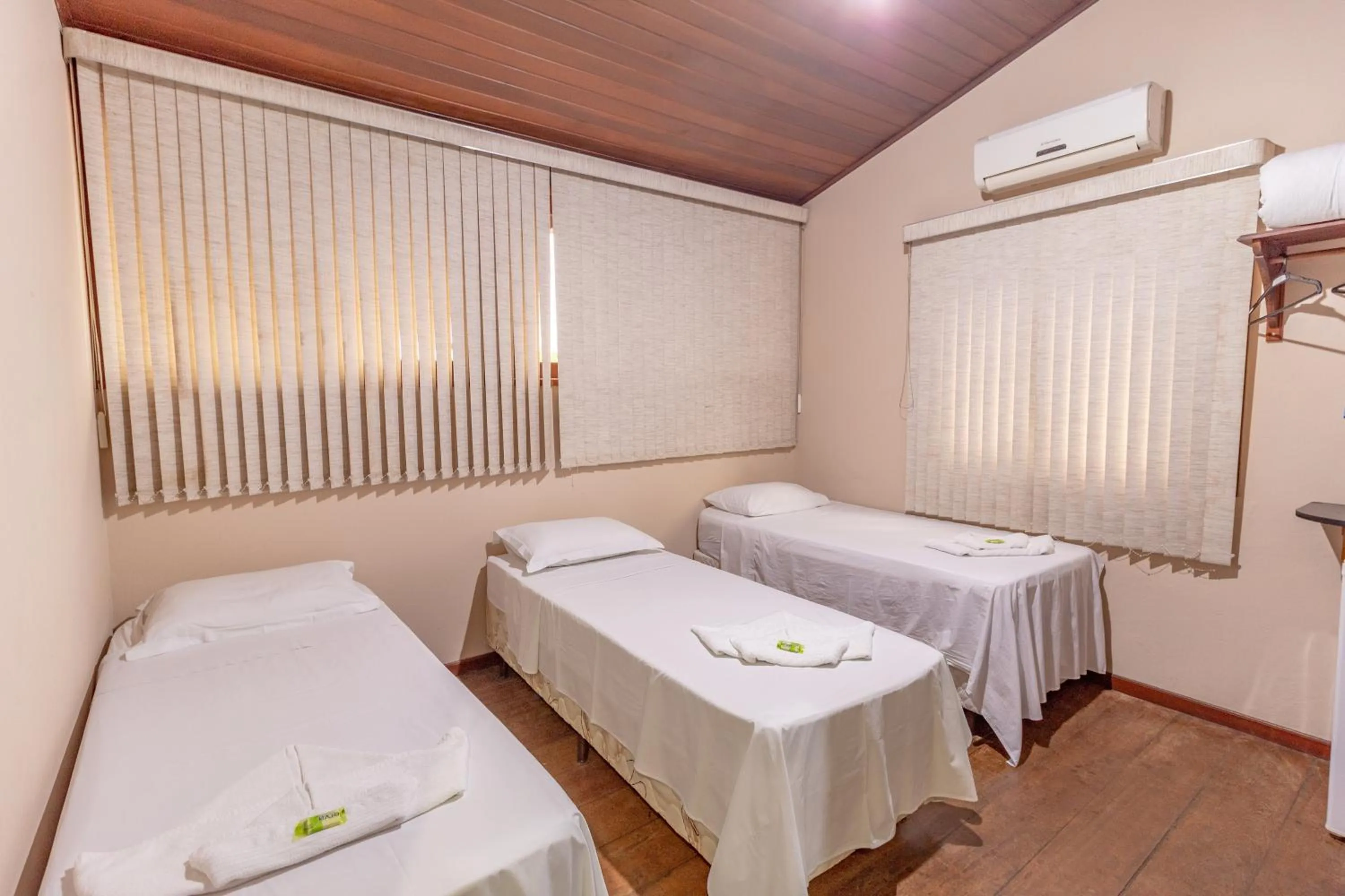 Bed in Pousada Luz do Sol