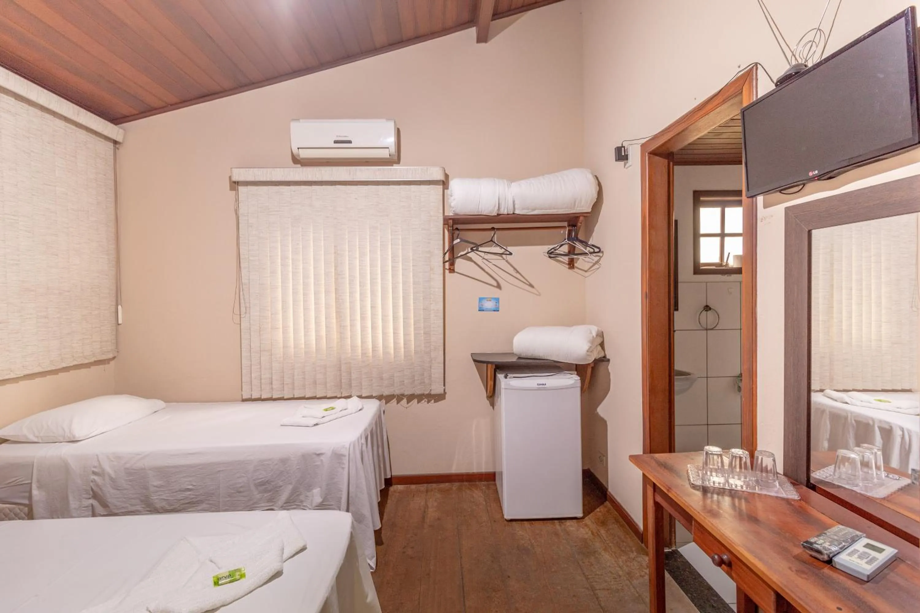 Bed in Pousada Luz do Sol