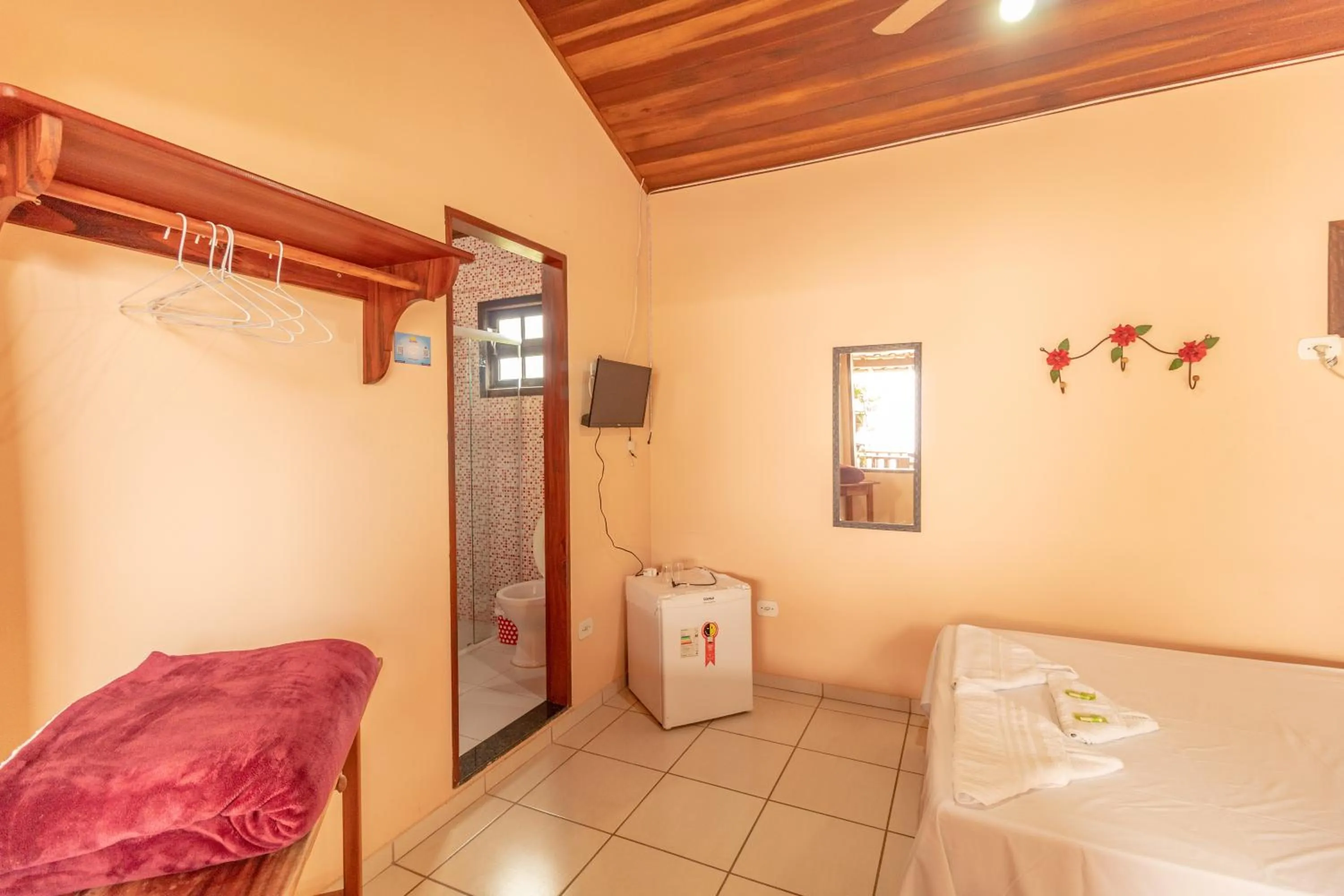 Bed in Pousada Luz do Sol