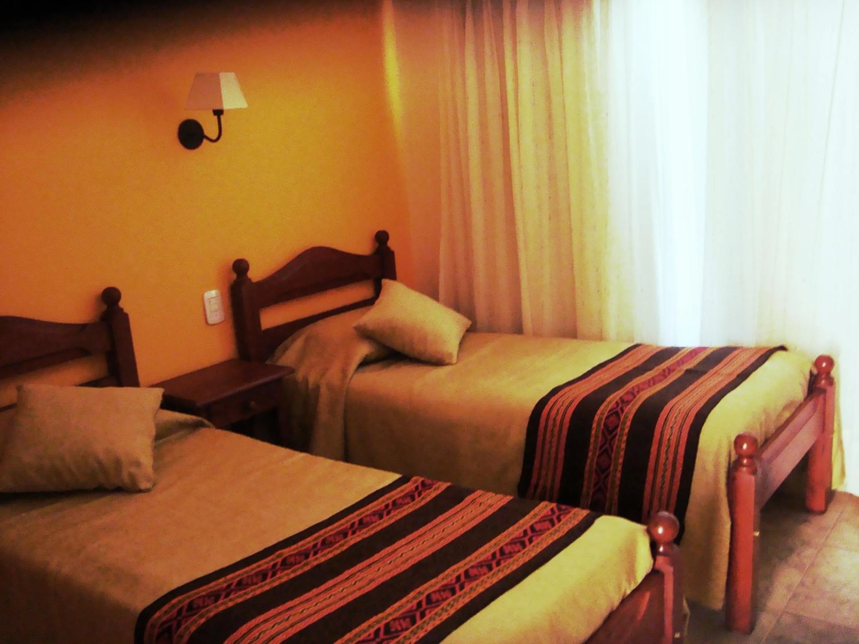 Decorative detail, Bed in Miralagos Apart & Cabañas