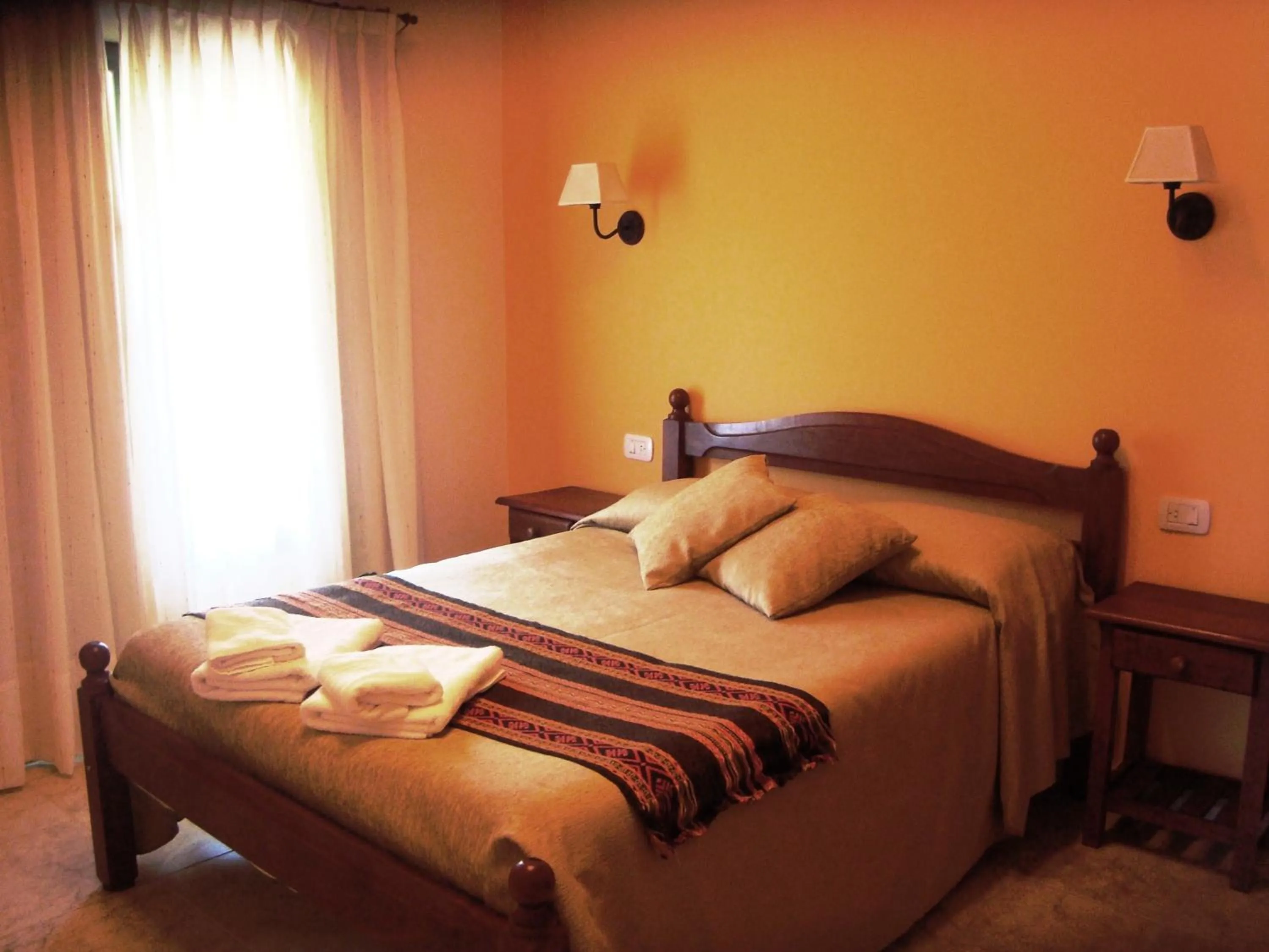 Decorative detail, Bed in Miralagos Apart & Cabañas