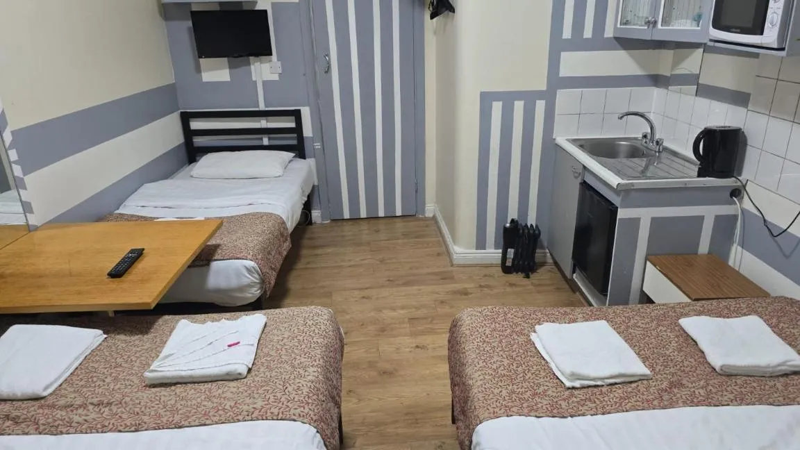 Photo of the whole room, Bed in Anwar House