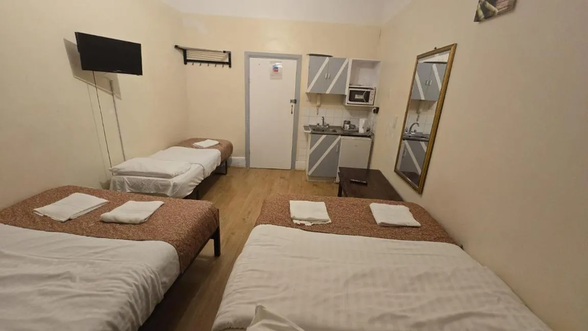 Photo of the whole room, Bed in Anwar House