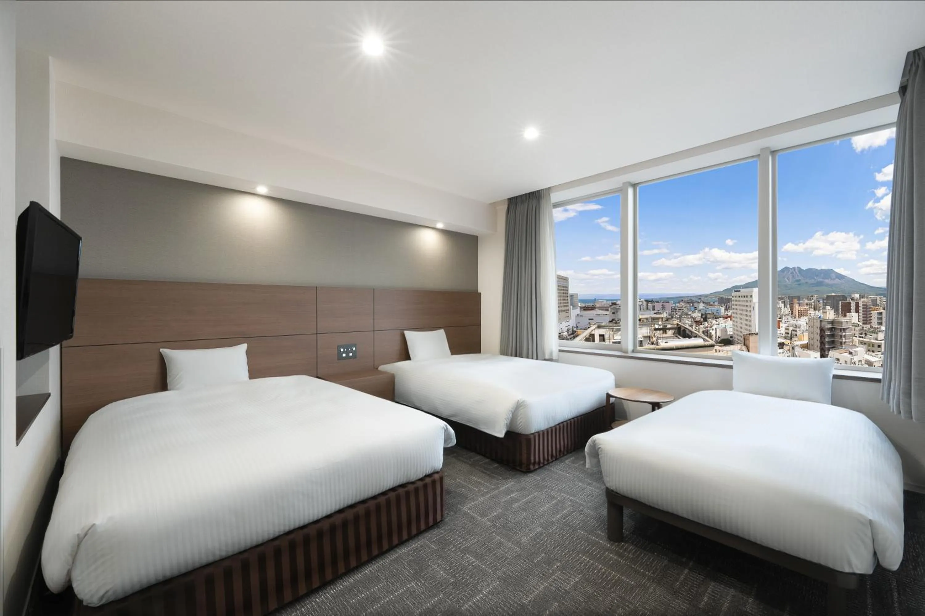 Bed in Hotel Oriental Express Kagoshima Tenmonkan