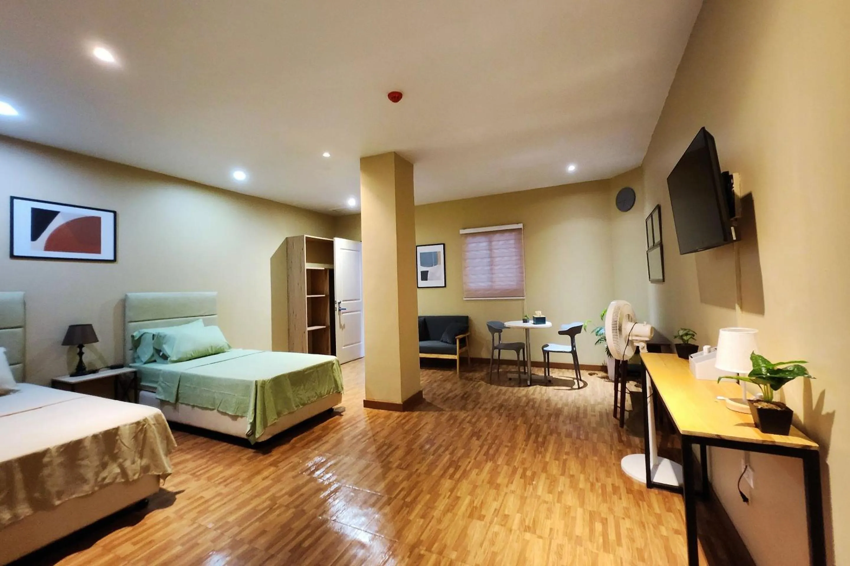 Bed in Freddo Studio Apartelle