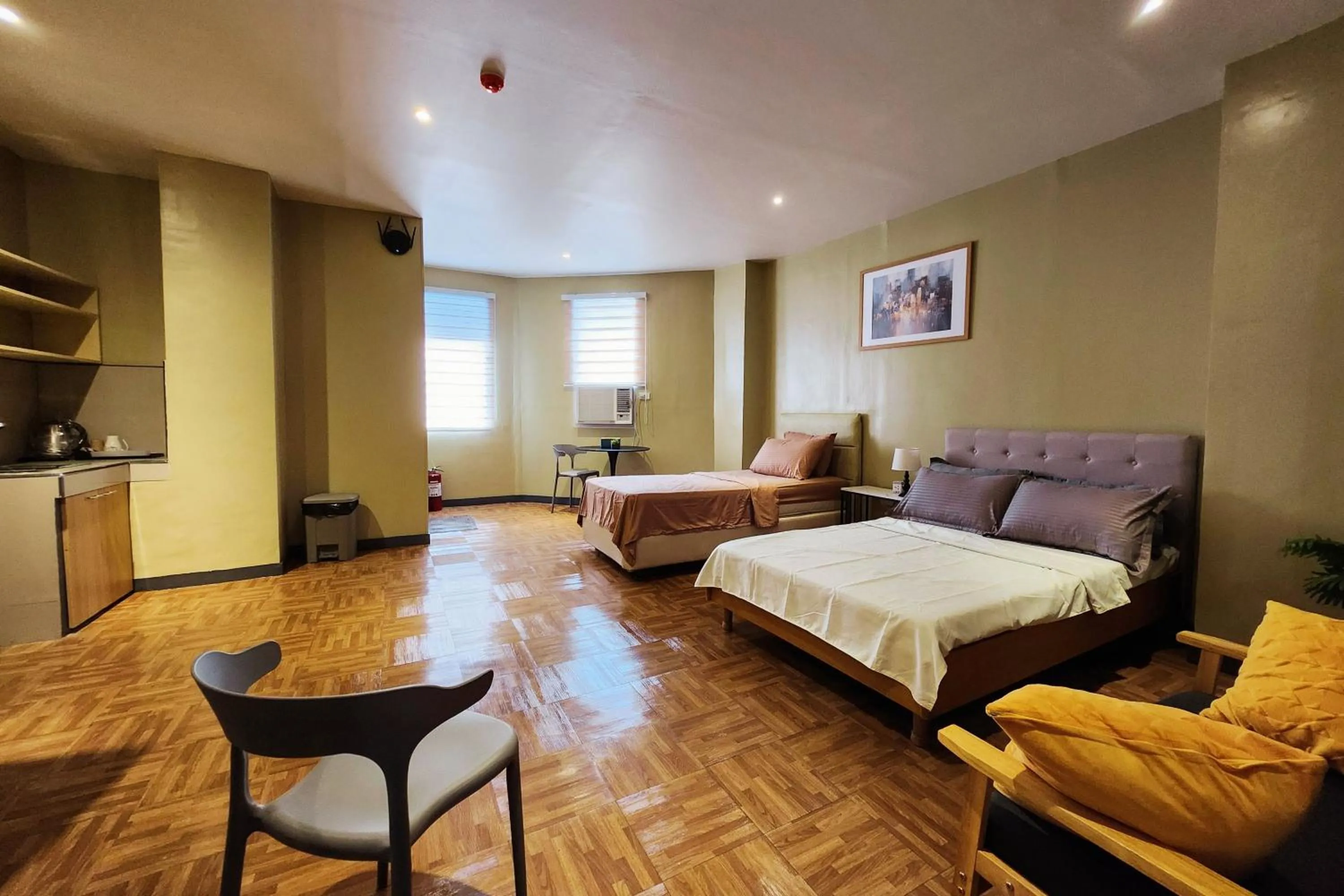 Bed in Freddo Studio Apartelle