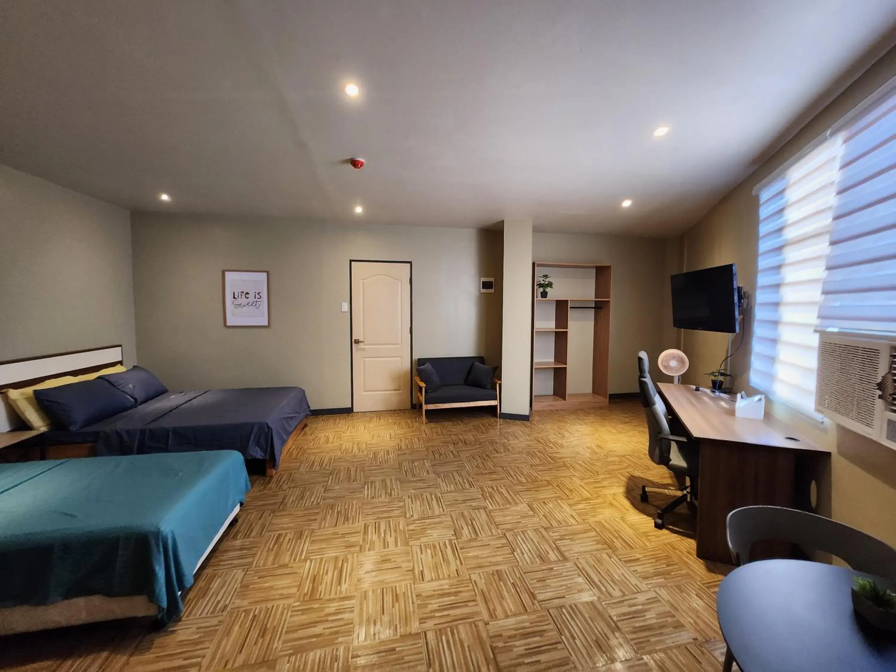 Bed in Freddo Studio Apartelle Bed in Freddo Studio Apartelle