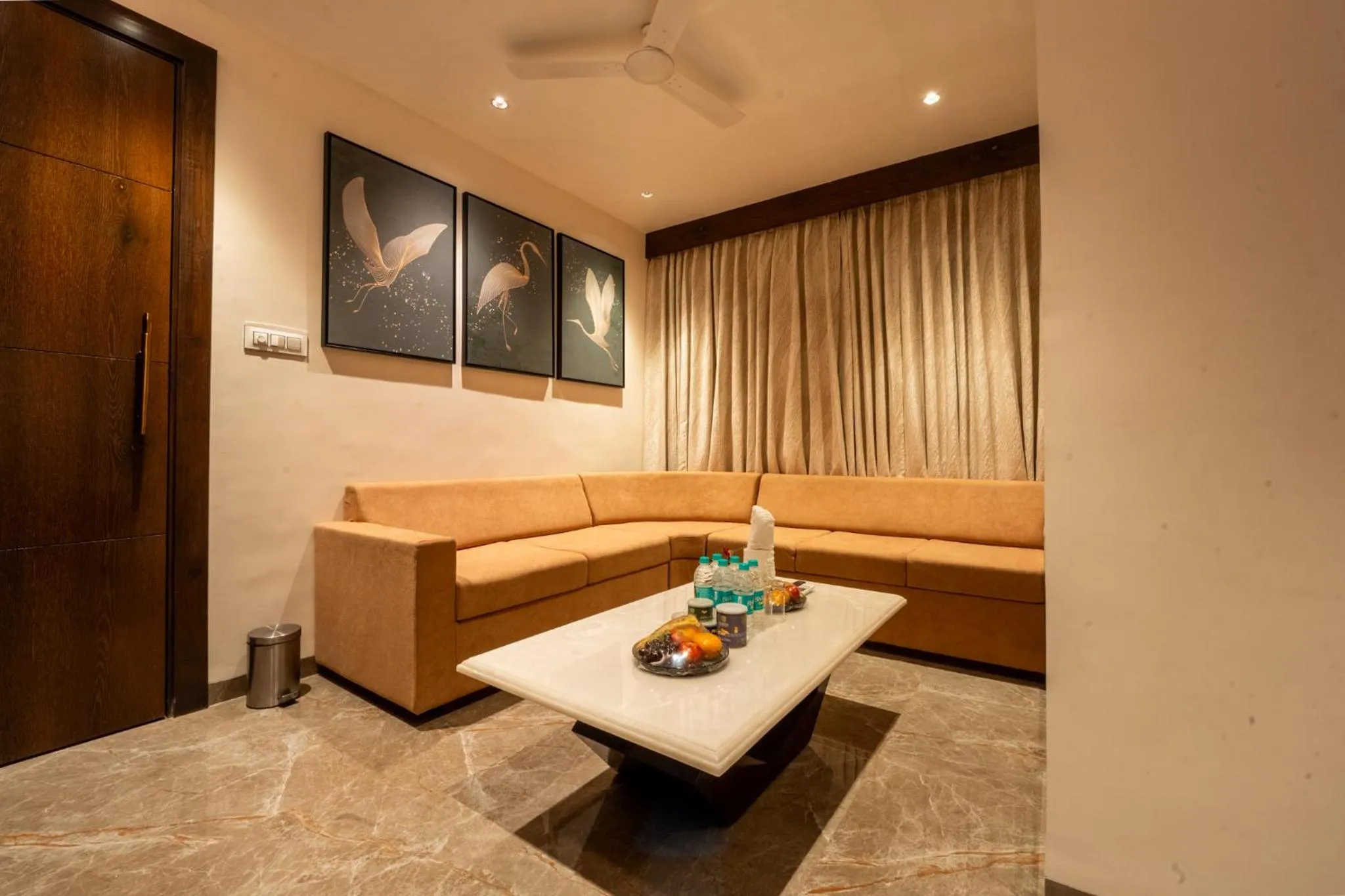 Seating area in Ramee Tarang Hotel Indore