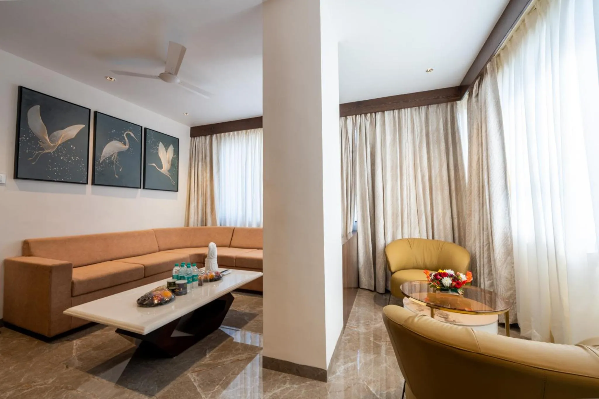 Seating area in Ramee Tarang Hotel Indore