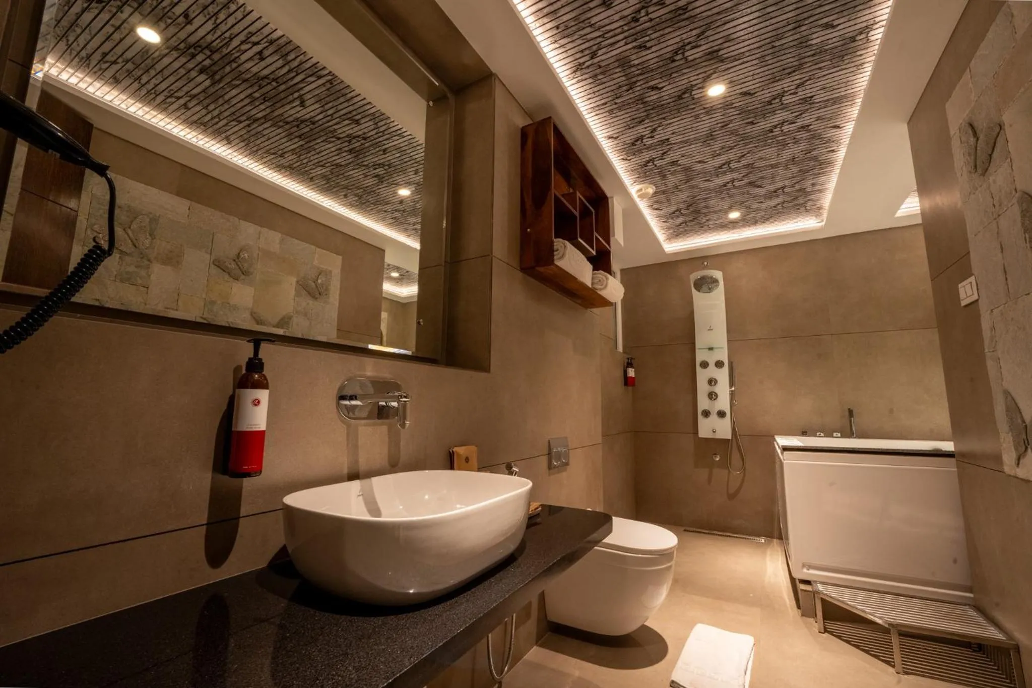 Shower in Ramee Tarang Hotel Indore