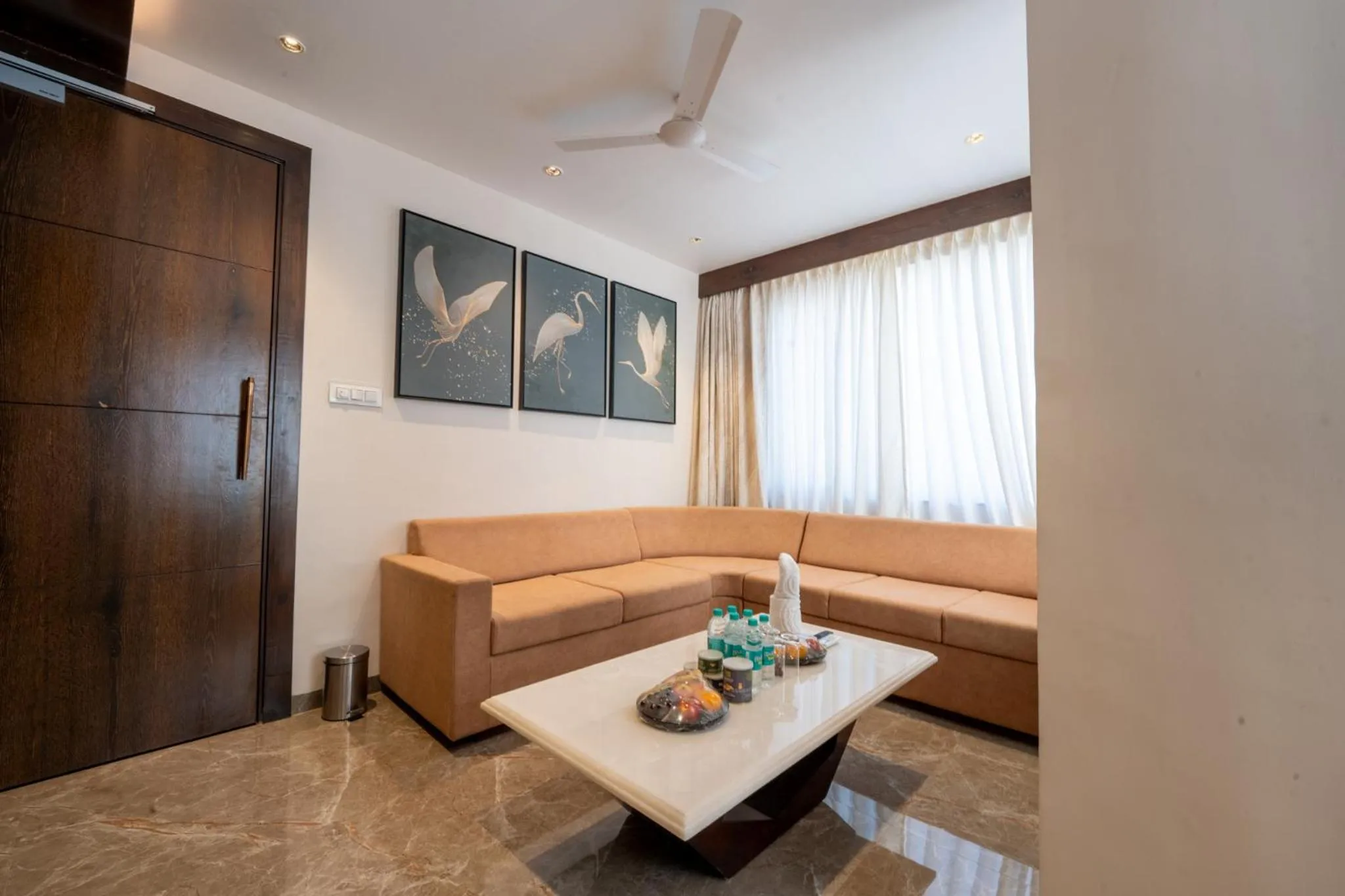 Seating area in Ramee Tarang Hotel Indore