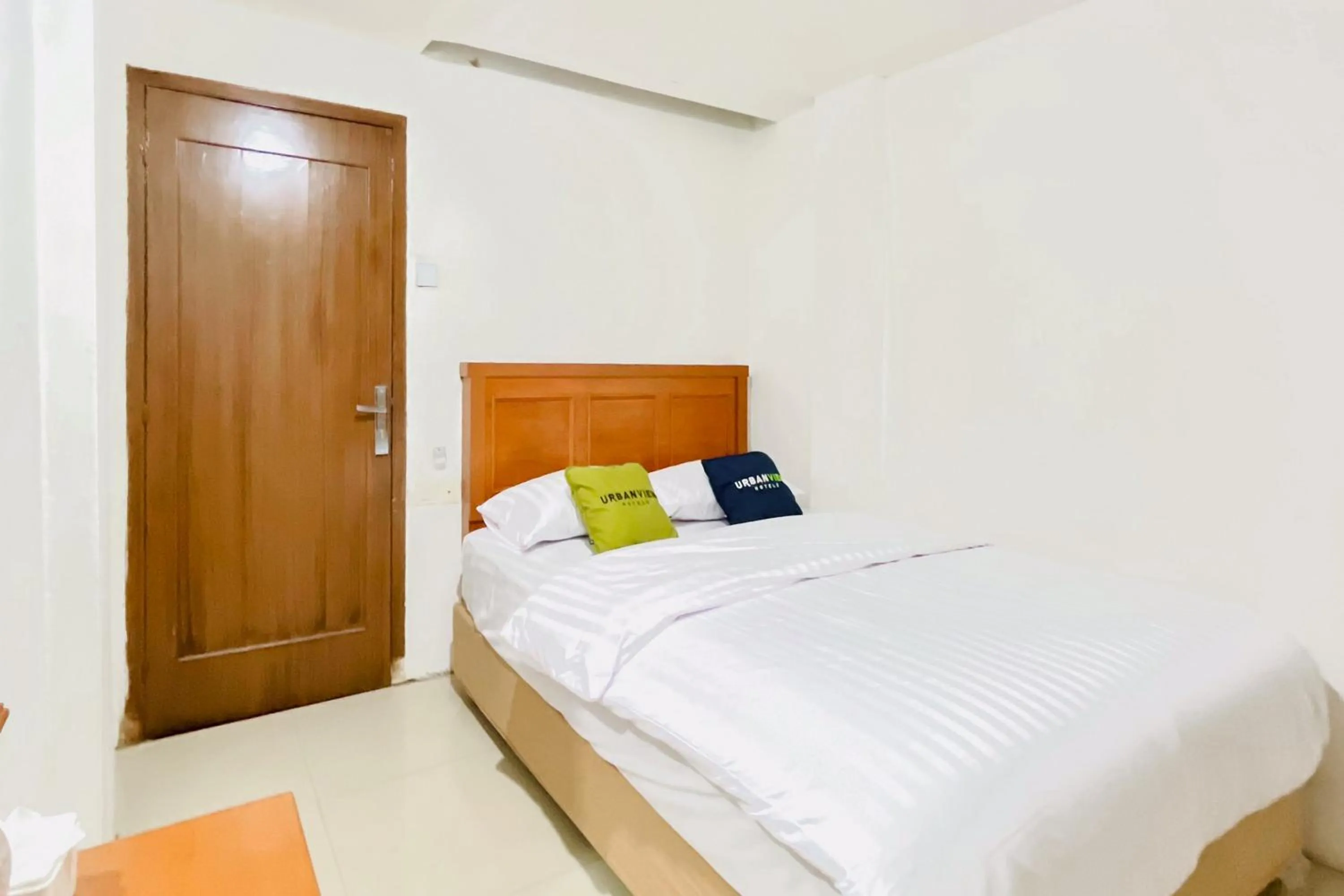 Bedroom, Bed in Urbanview Hotel Grand Mohaga Medan