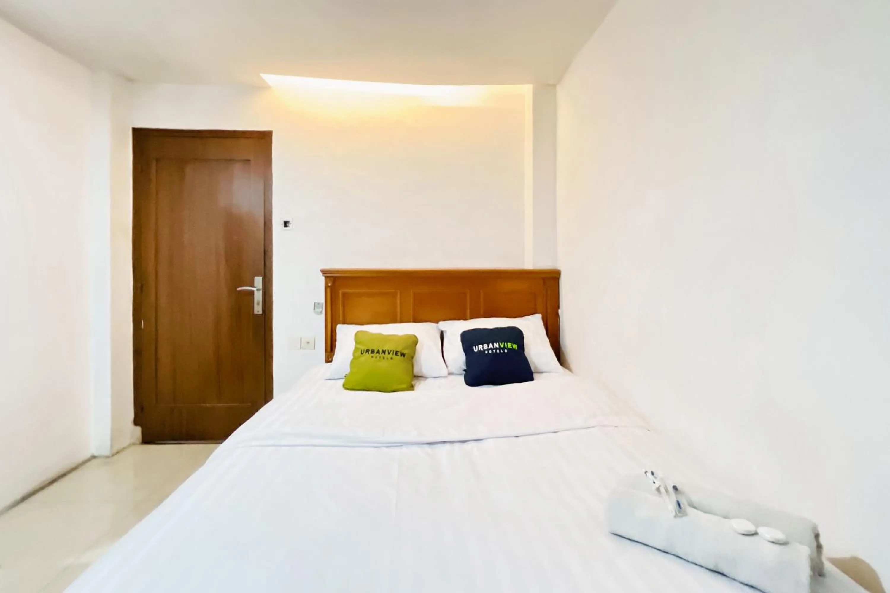 Bedroom, Bed in Urbanview Hotel Grand Mohaga Medan